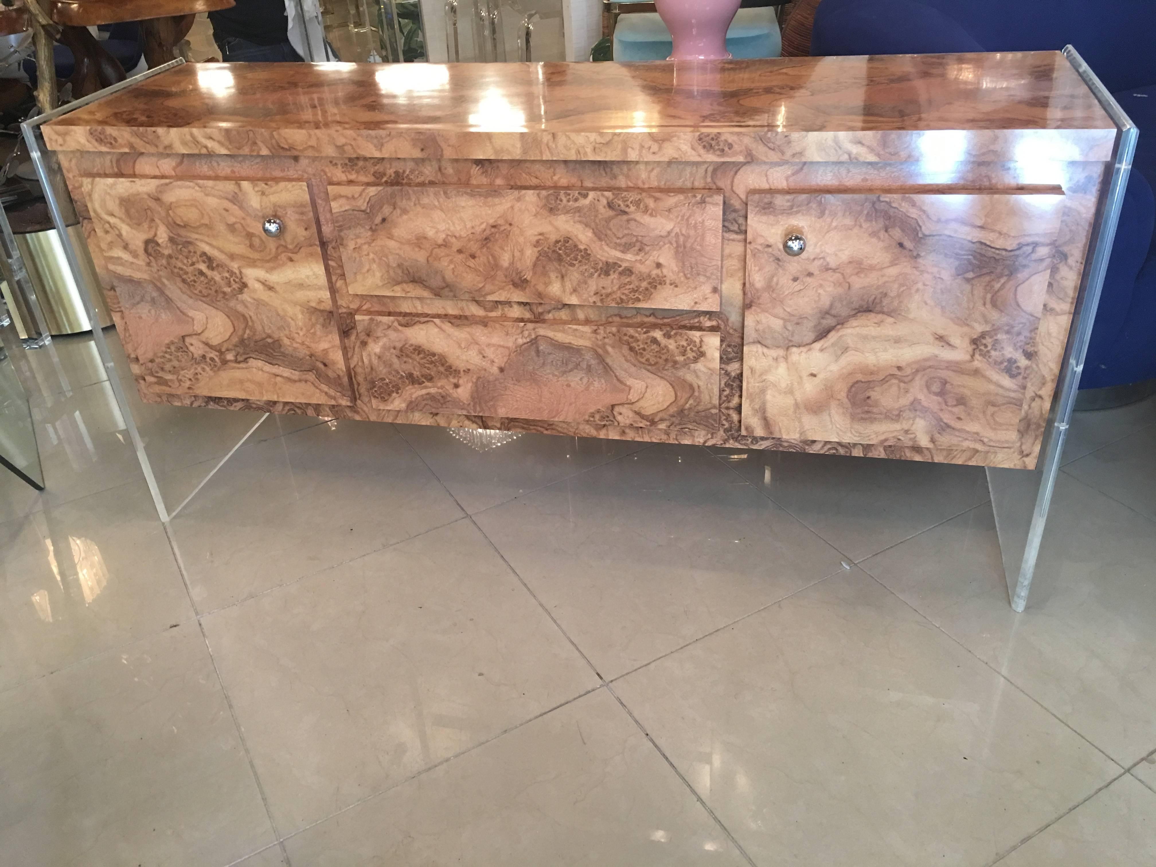 Vintage faux burl and Lucite sided credenza, buffet, sideboard or dresser with original chrome knobs. This piece is in great condition. The Lucite is clear.