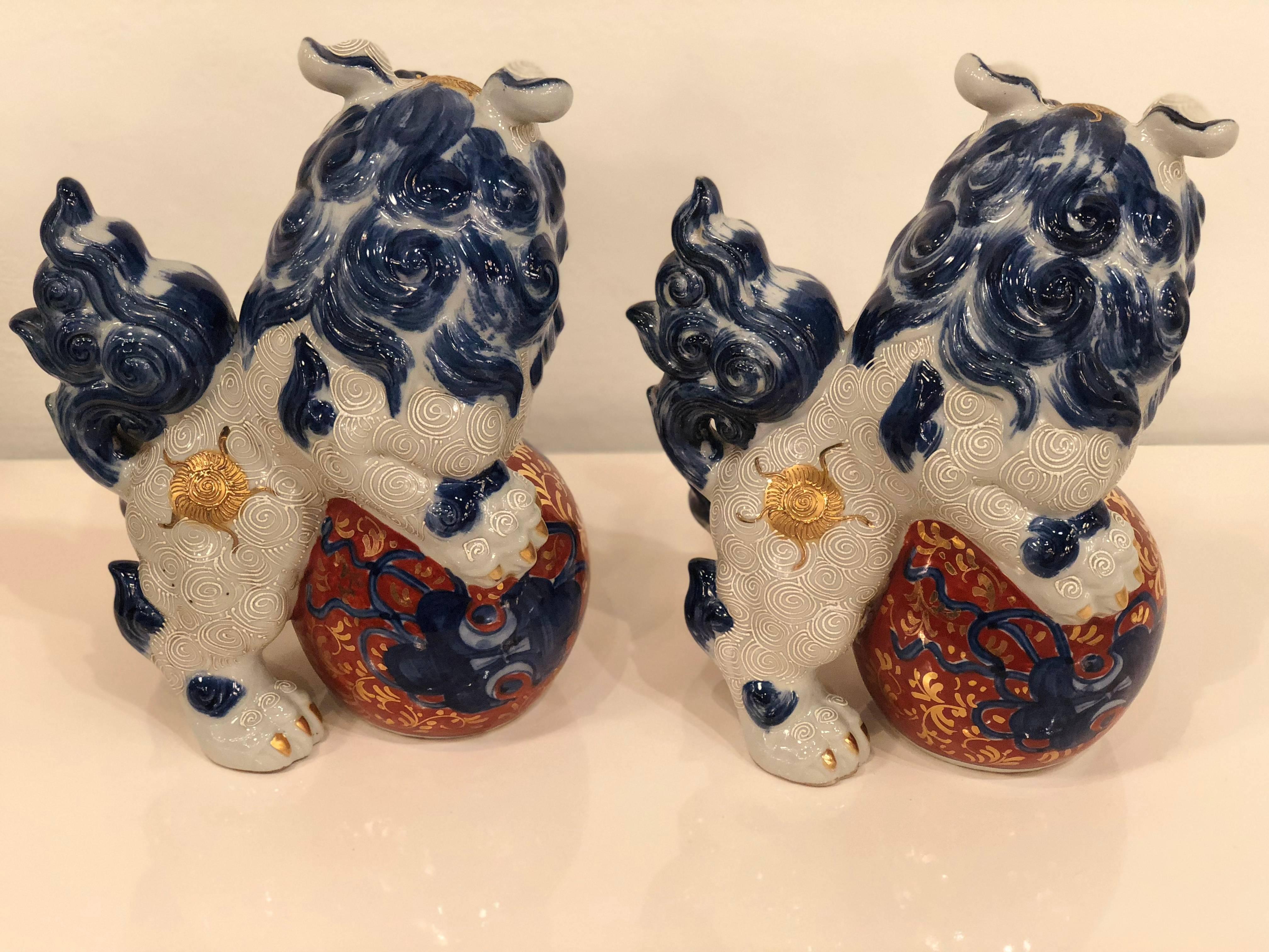 Japanese Vintage Pair of Chinoiserie Blue and White Foo Dogs  For Sale