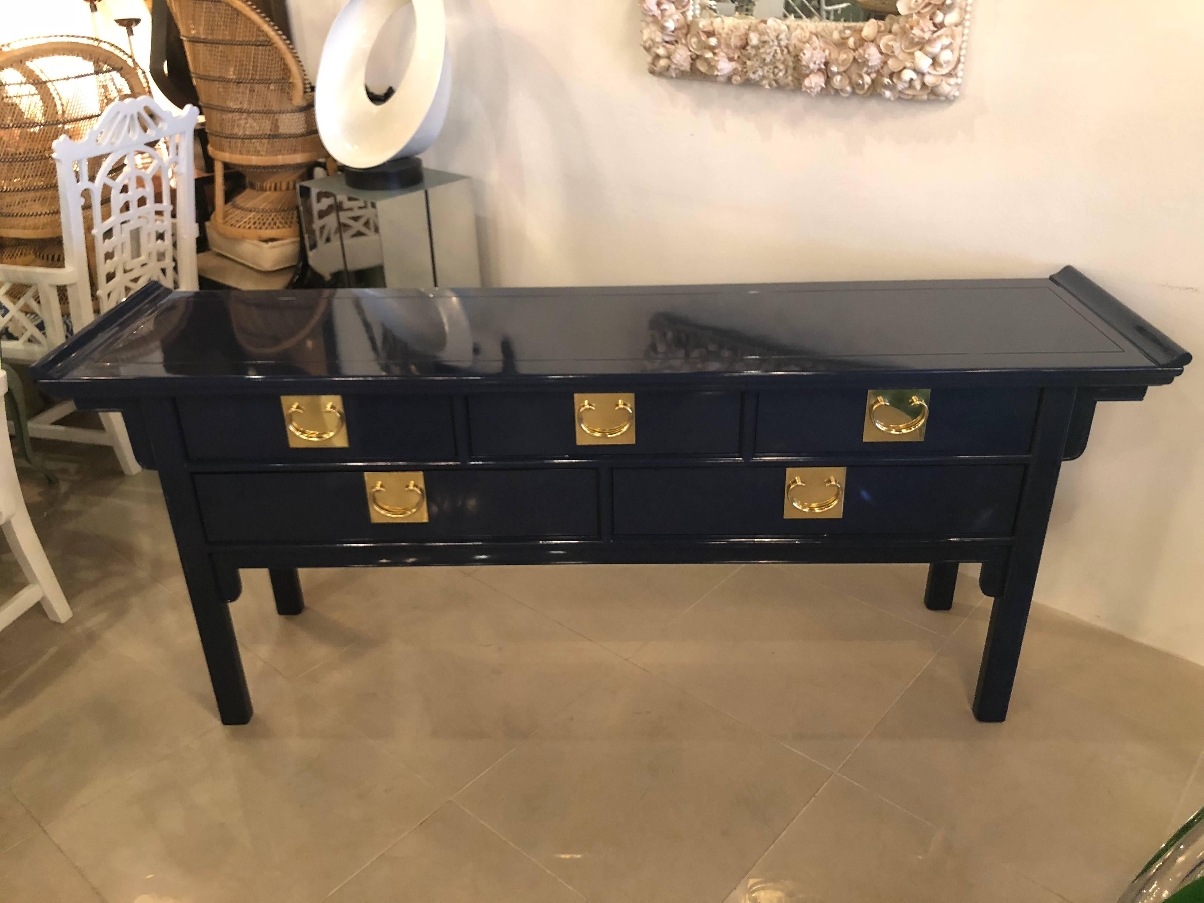 Beautiful vintage chinoiserie pagoda console table by Century Furniture. This has been completely restored. Professionally lacquered in a navy blue gloss finish, inside drawers are also done (pictured). Brass hardware has been polished.
