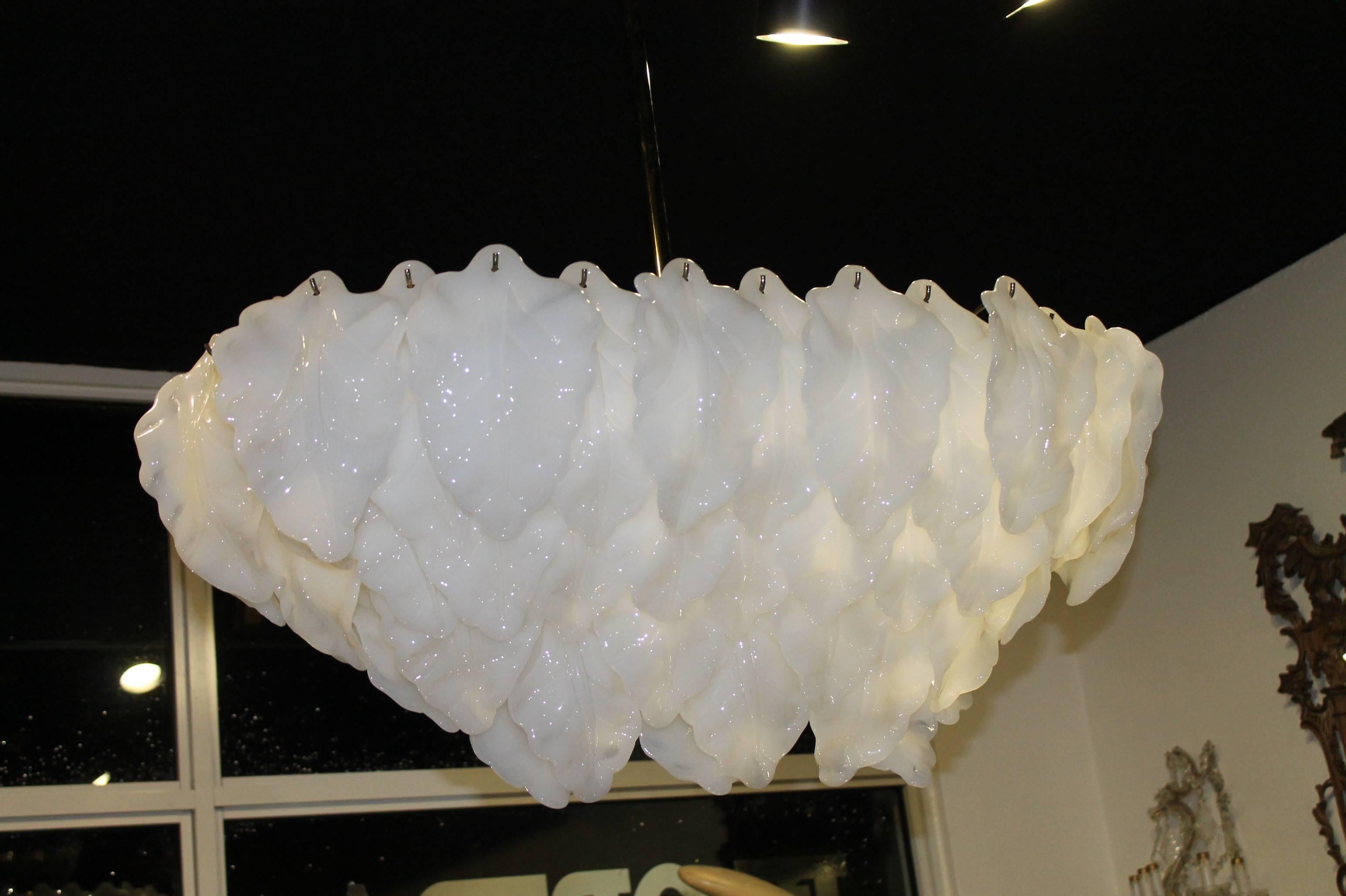 Murano glass leaf leaves white opaque leaves. Amazing vintage chandelier that gives the feeling of a cloud above. Perfect Hollywood Regency, Palm Beach feel! 
Made in Italy
