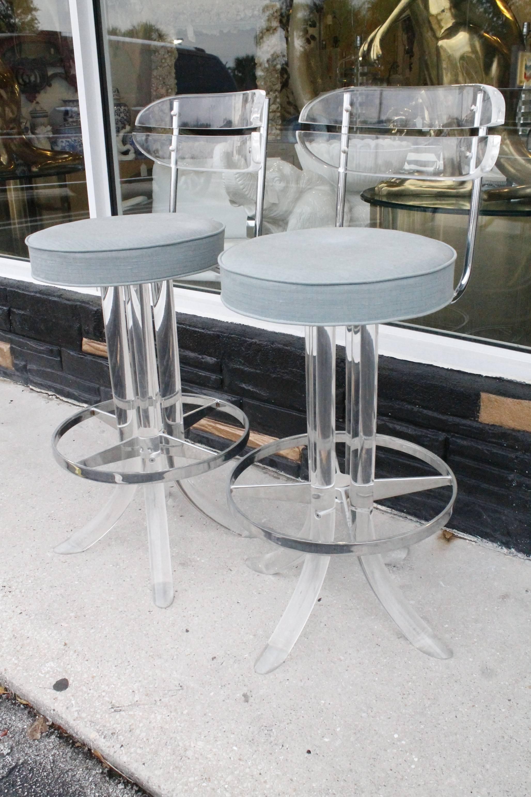 Pair of Charles Hollis Jones Hill manufacturing Lucite and chrome barstools. They swivel and the swivel position can retain in each position if you want. Original upholstery which is faded.
Hollywood Regency, Mid Century Modern, Vintage 