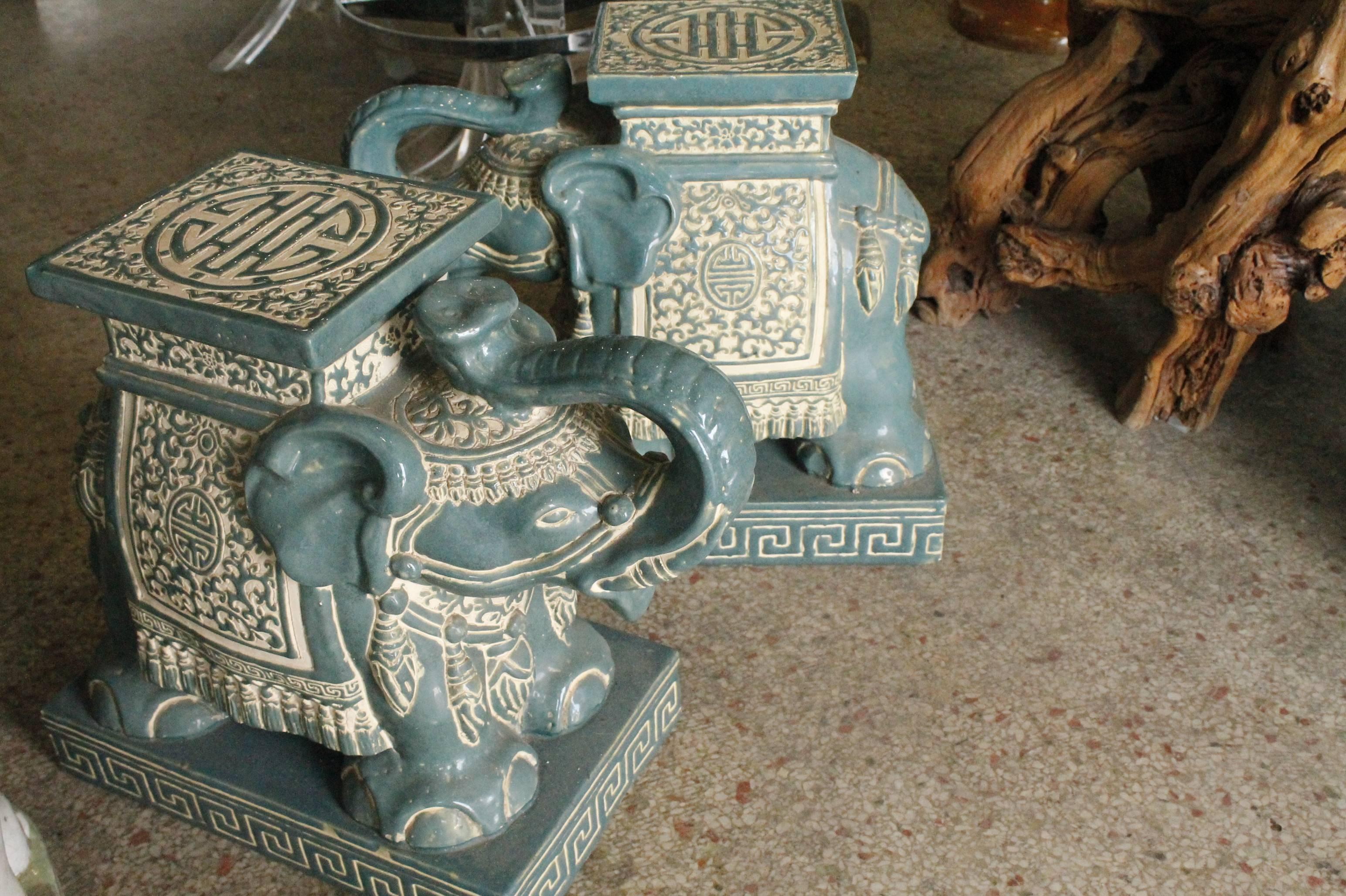 Great teal blue green color pair of vintage elephants. No chips or breaks.