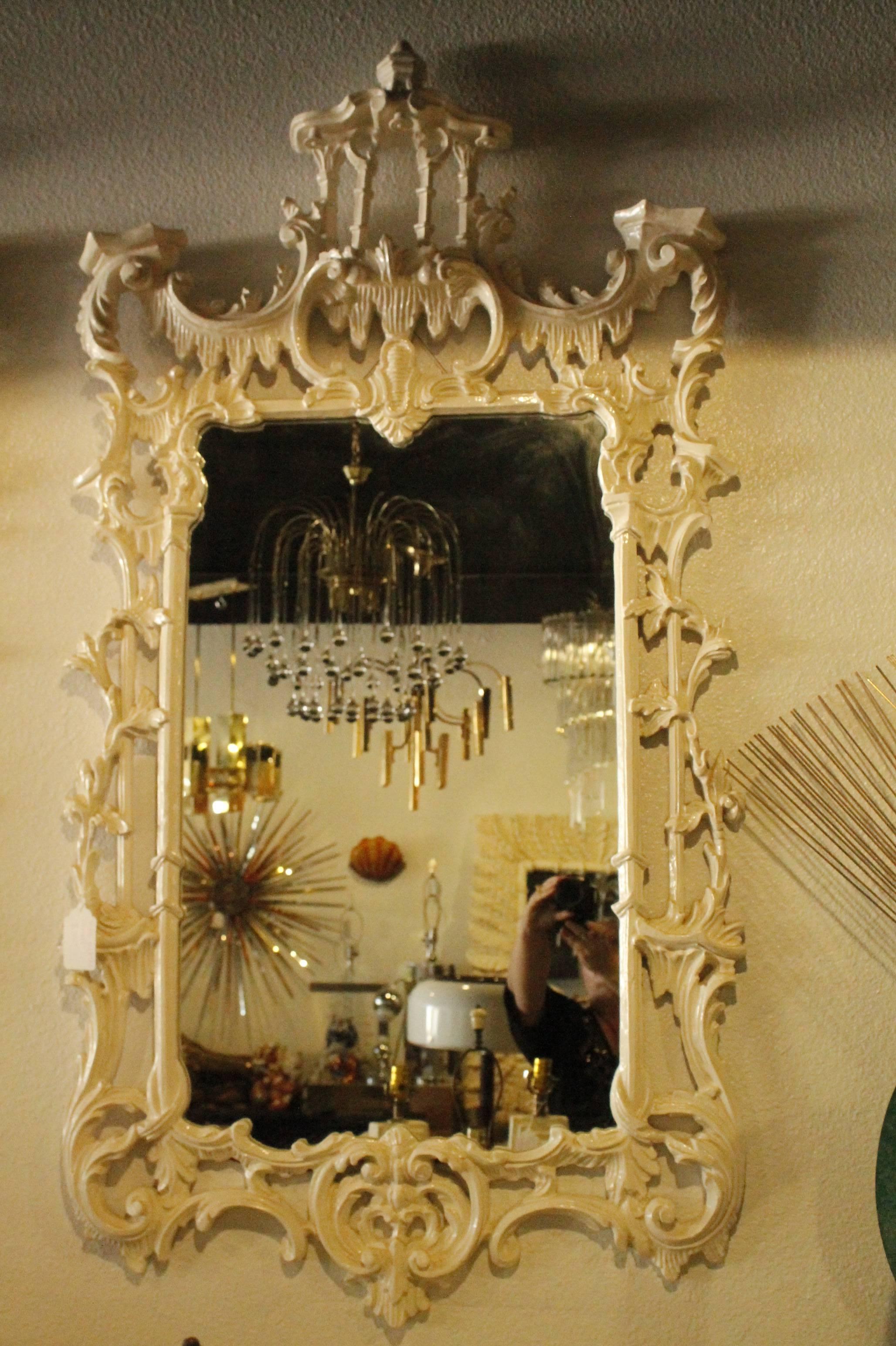 Lovely pair of vintage Hollywood Palm Beach Regency Chinese Chippendale pagoda wall mirrors with bells. These can be purchased as is one yellow and one white or buyer can choose a new color for the pair to be professionally lacquered. Please allow