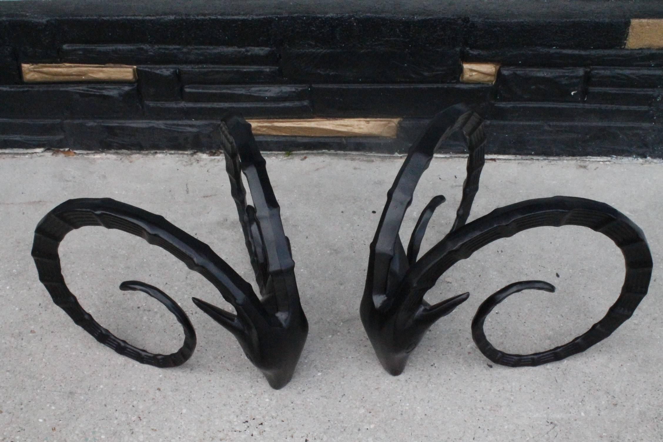 Wonderful Vintage Hollywood Regency pair of black metal Ibex Gazelle ram's head coffee cocktail table. Glass top not included. I also have the matching Dining Table or Desk base available if you are interested. 
     