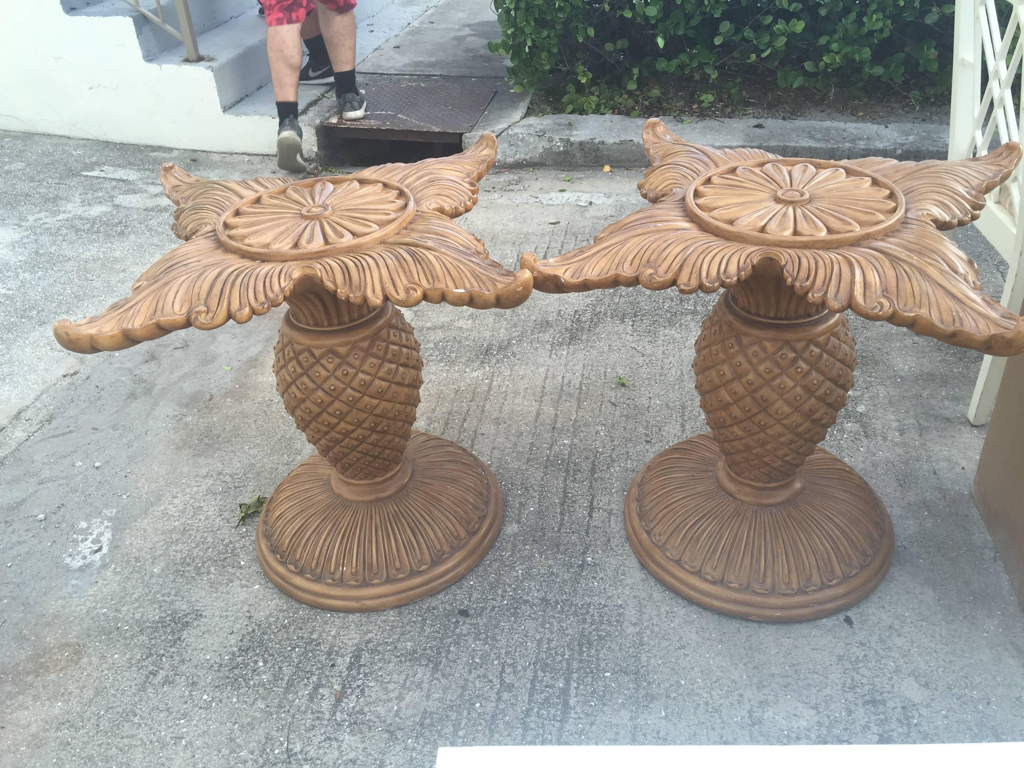 Lovely pair of vintage wood carved pineapple bases perfect for a dining table base or a desk base. Glass top not included. These can be left as is or lacquered a great color. If interested in lacquering please inquire. 
Tropical Island, Palm Beach,