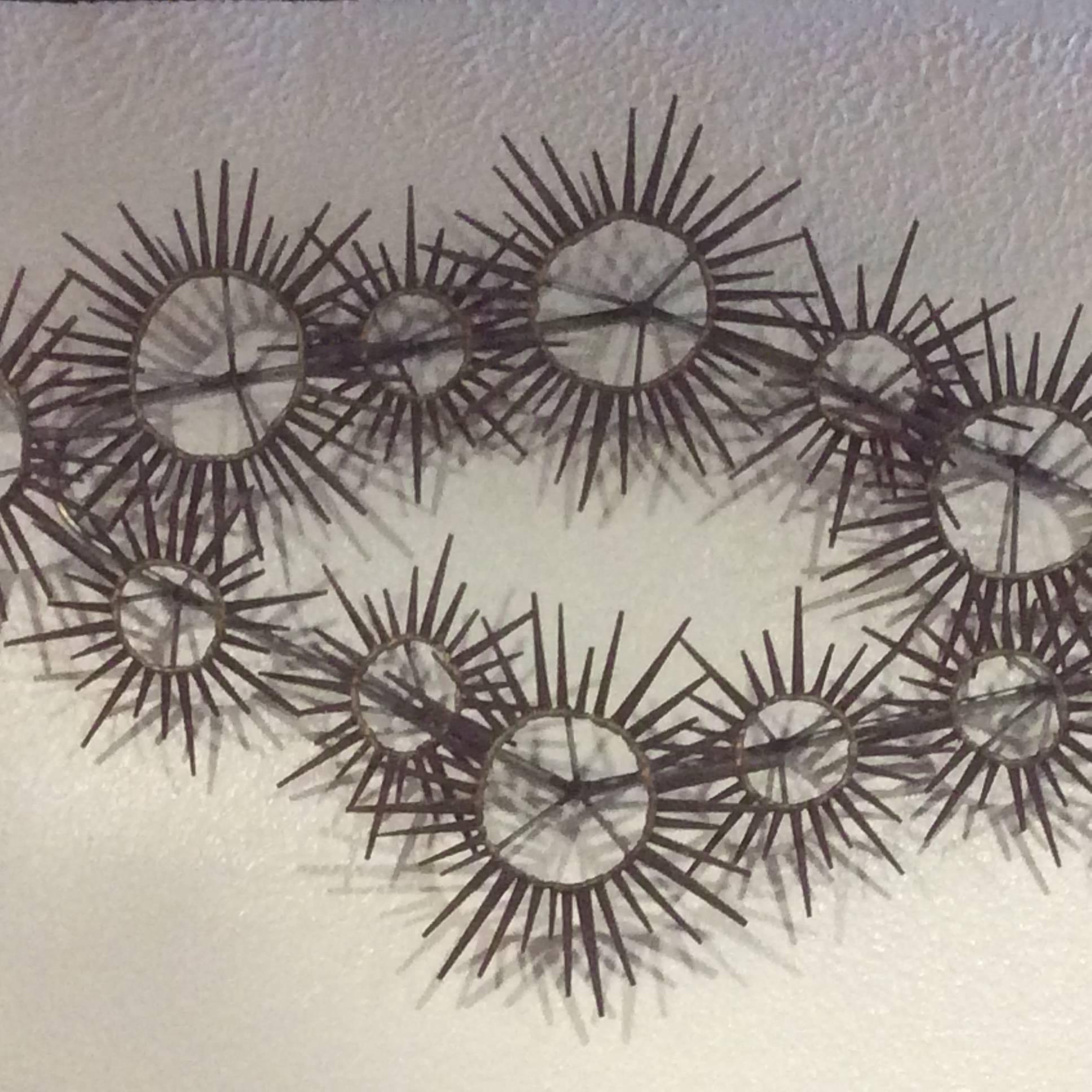 Amazing vintage metal Brutalist nail sunburst, starburst wall art. In the style of Silas Seandel, Curtis Jere. Great mid century modern piece.

