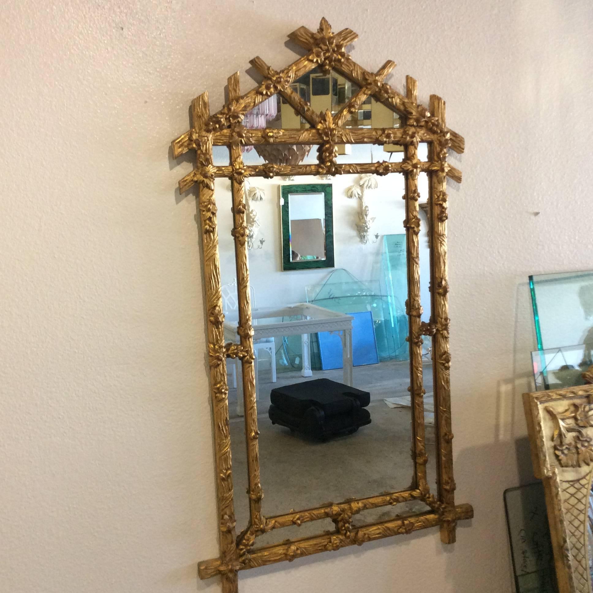 Beautiful vintage Hollywood Palm Beach Regency, faux bois wood wall mirror with floral motif accents. Perfect for that chinoiserie, Chinese Chippendale home decor feel!