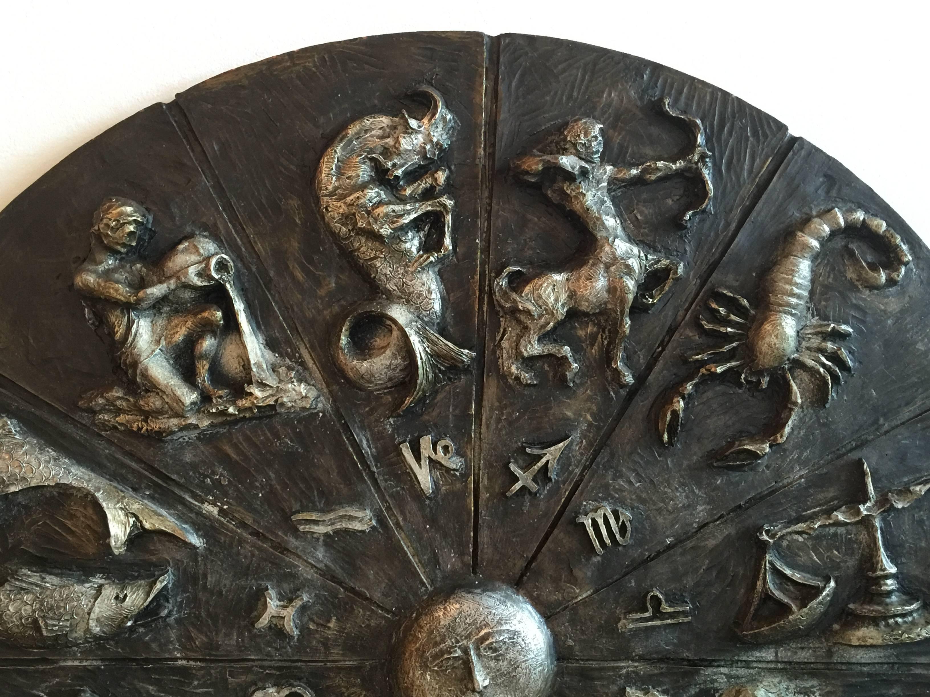 Vintage Brutalist monumental zodiac wall plaque, 1963 signed Seguso.
Mid-Century Modern, horoscope, astrology, astrological signs, circular, round,
The depth noted below accounts for the plaque only not the 3d dimensional effects of the signs.