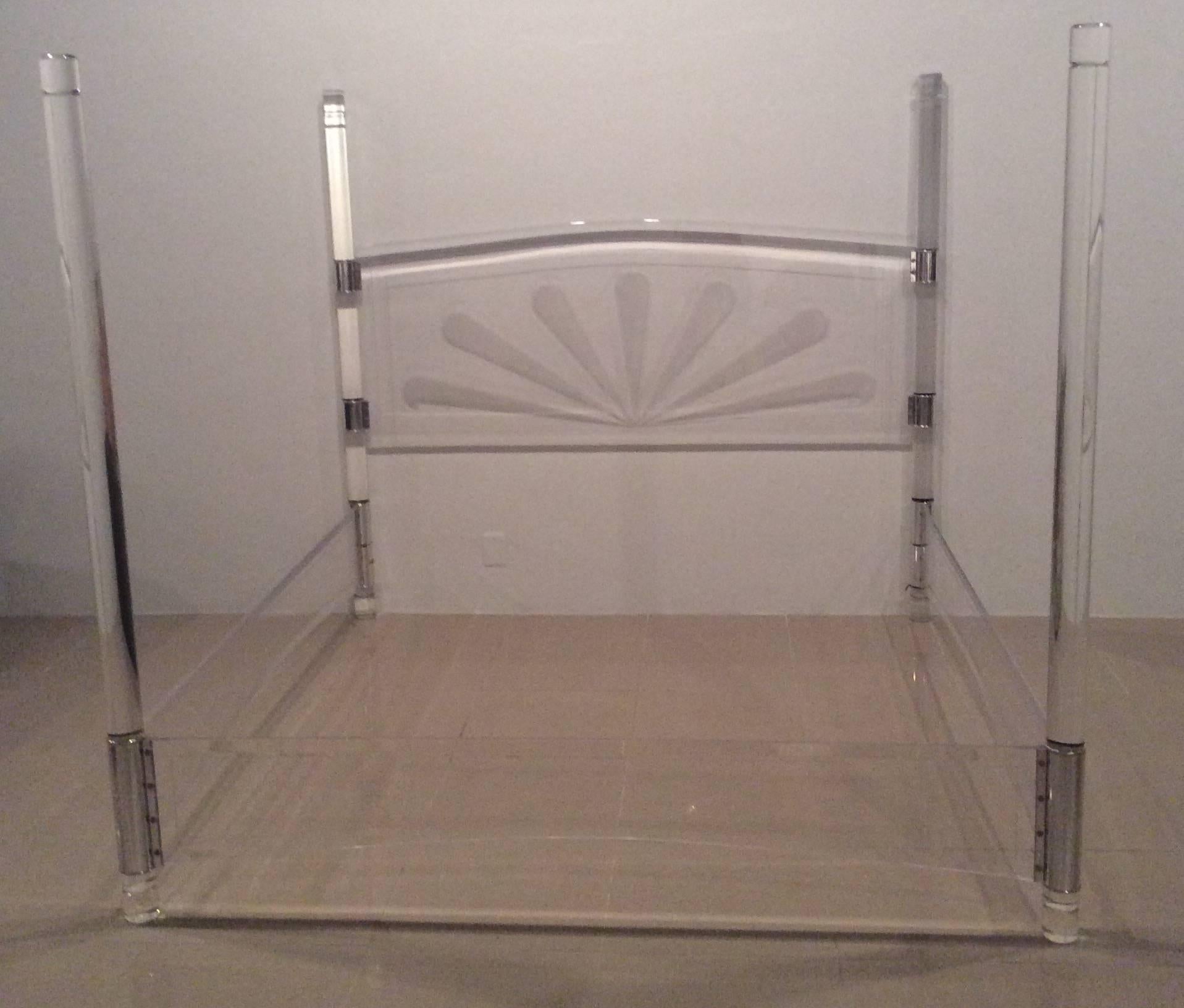 Incredible vintage mid century modern, Lucite and chrome bed in the style of Charles Hollis Jones, four post canopy style, king-size, includes headboard, side rails, footboard, posts. The Lucite is incredibly thick! This is in excellent shape and