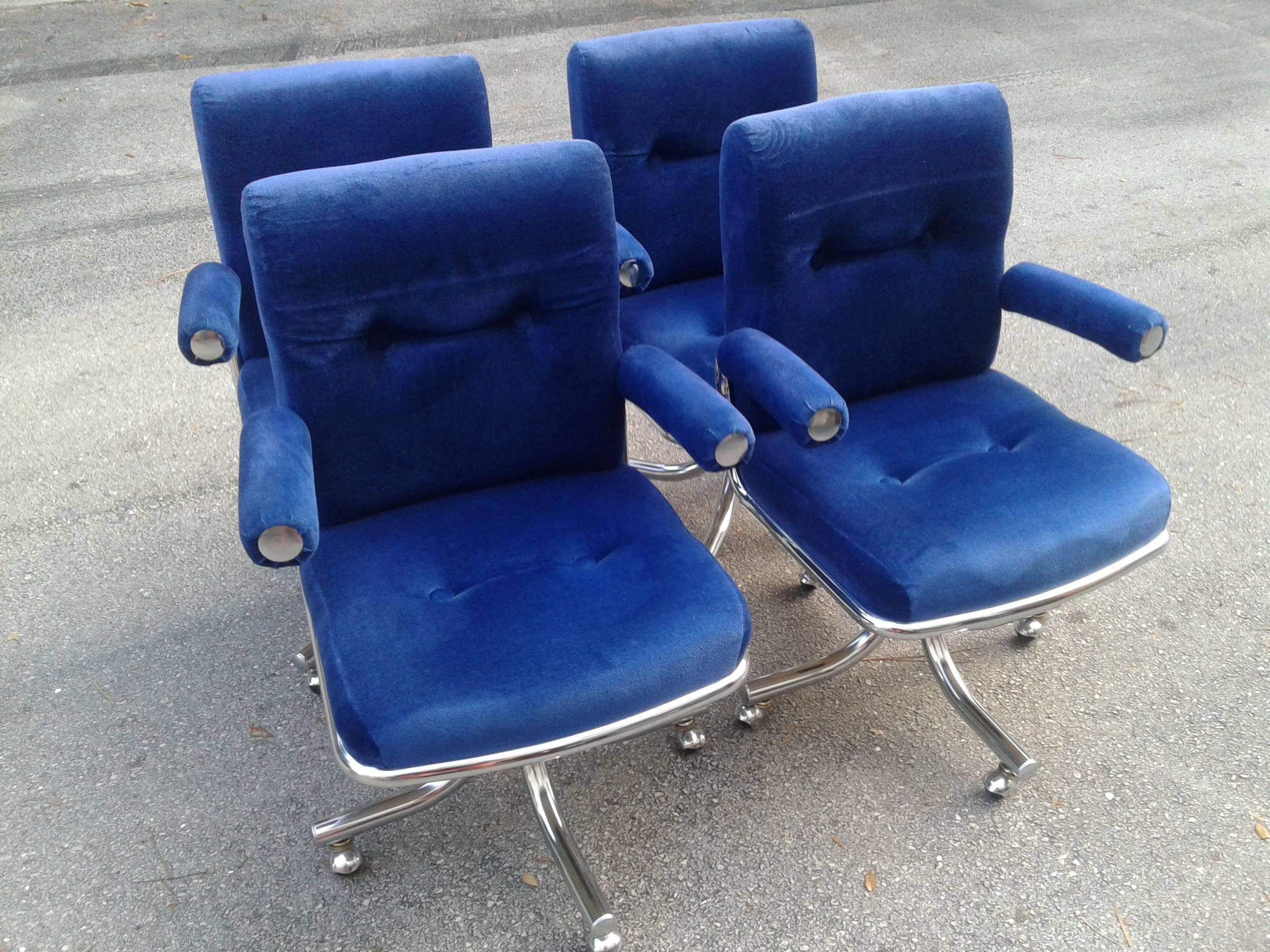 Aren't these just absolutely beautiful! You can purchase these individually one or all 4. vintage Hollywood Regency, blue velvet corduroy like fabric with chrome base, arm ends. Swivel base armchairs. Original fabric in good condition, may have some