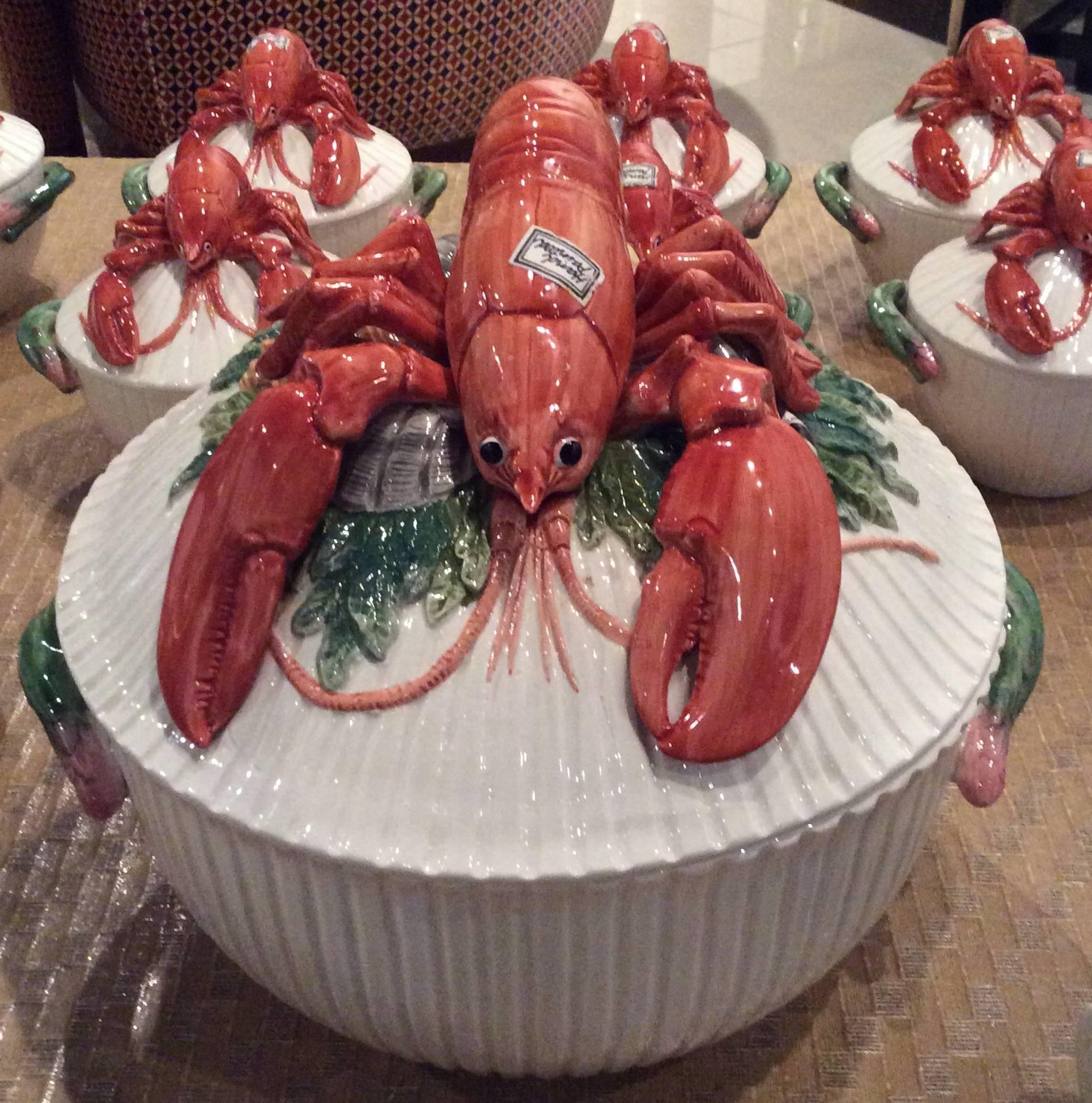 The most amazing vintage Fitz & Floyd lobster serving set, 11 pieces. All original labels are still present on each piece, all pieces are marked FF (Fitz and Floyd), all original boxes are included. This set was never used. Set includes oversized