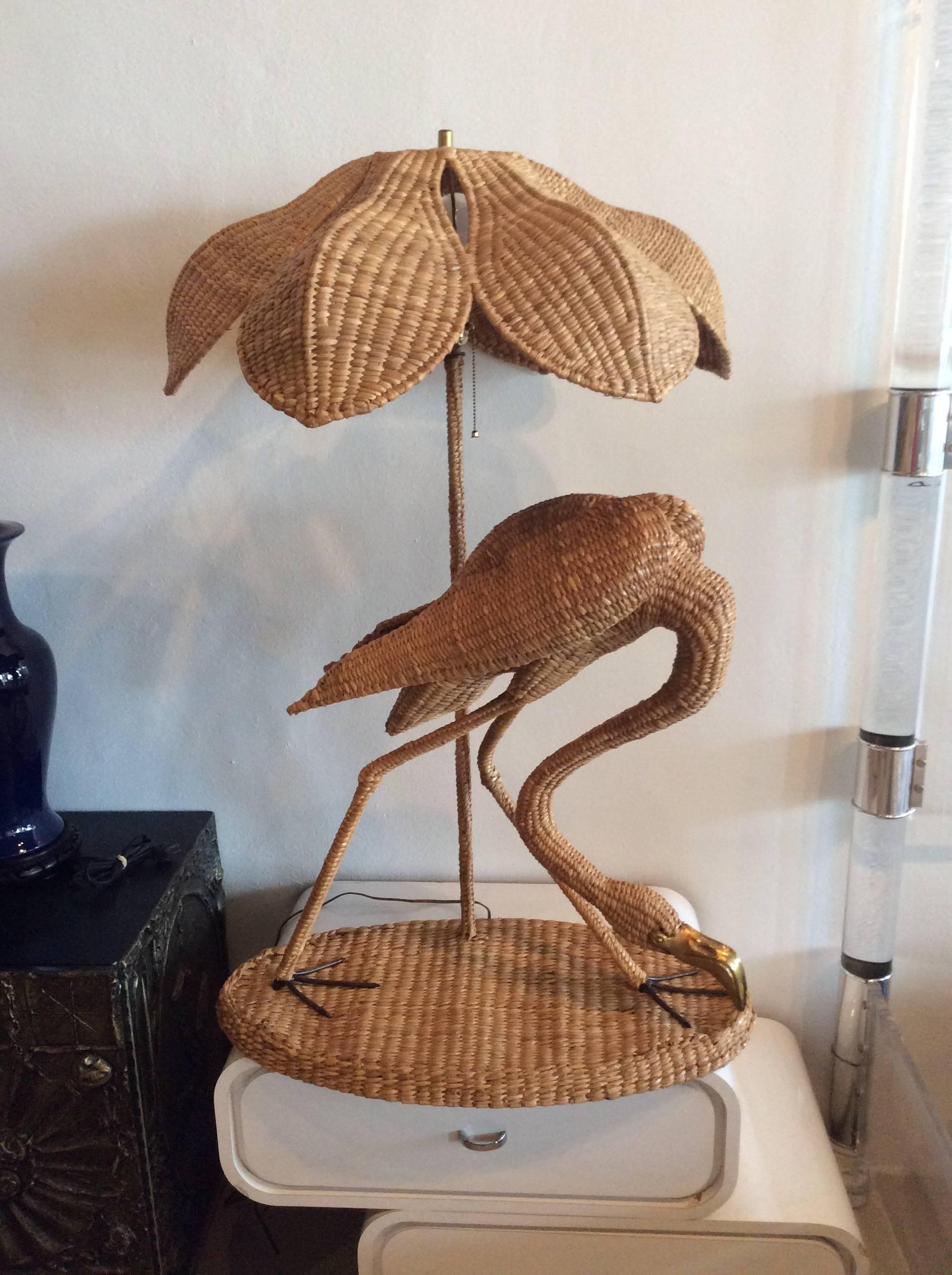 The most amazing Mario Lopez Torres Flamingo Bird Rattan, wicker and brass table or floor lamp with original shade. Tagged underneath (pictured) and dated 1974. Perfect for that tropical island, Palm Beach, Hollywood Regency decor.

Measures 43 to