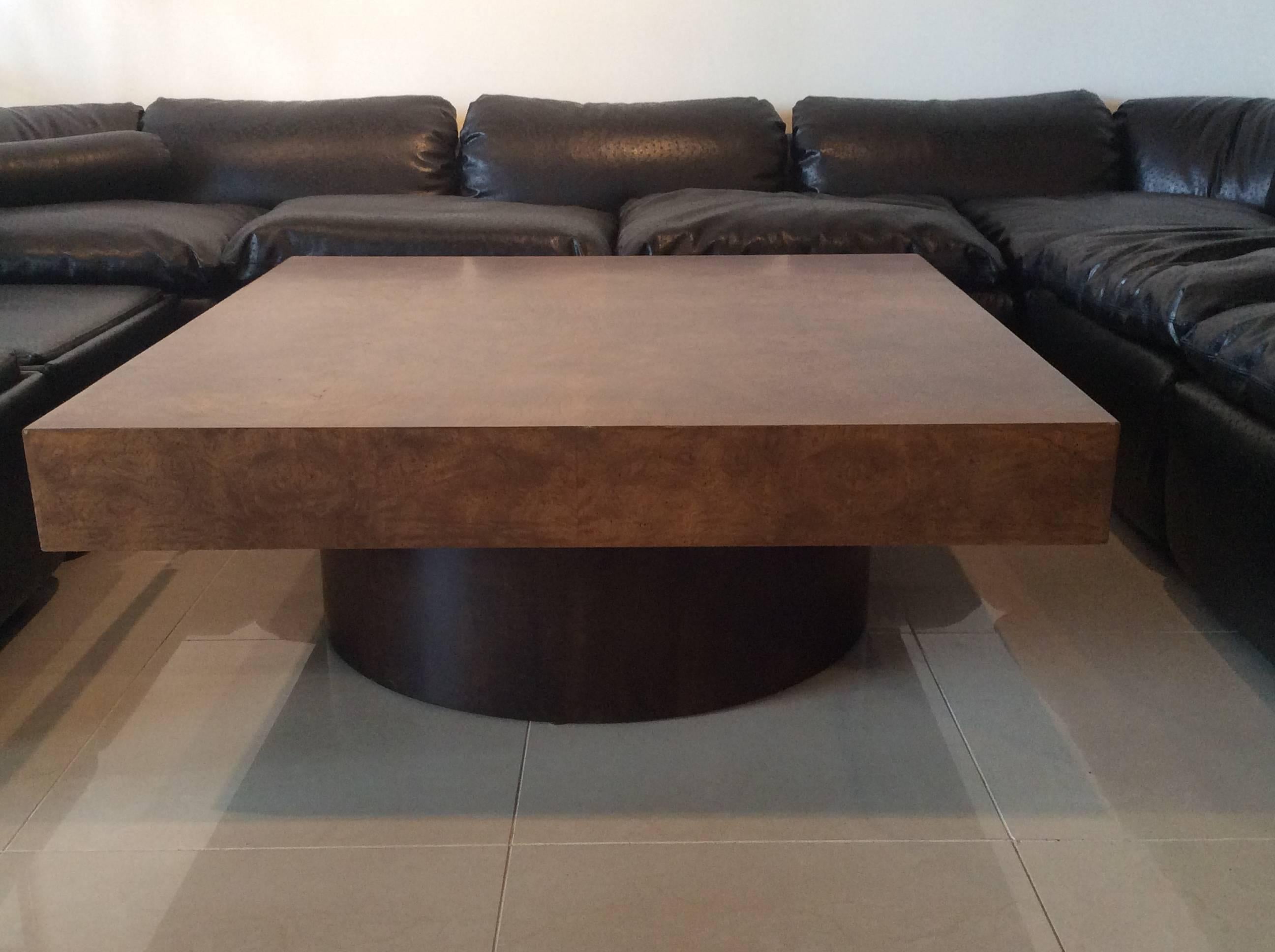 Vintage burl wood square coffee cocktail table. Round, cylindrical, column base, in a darker wood with a patchwork lighter Burl wood table top. Great for the Mid-Century Modern, Hollywood Regency decor.