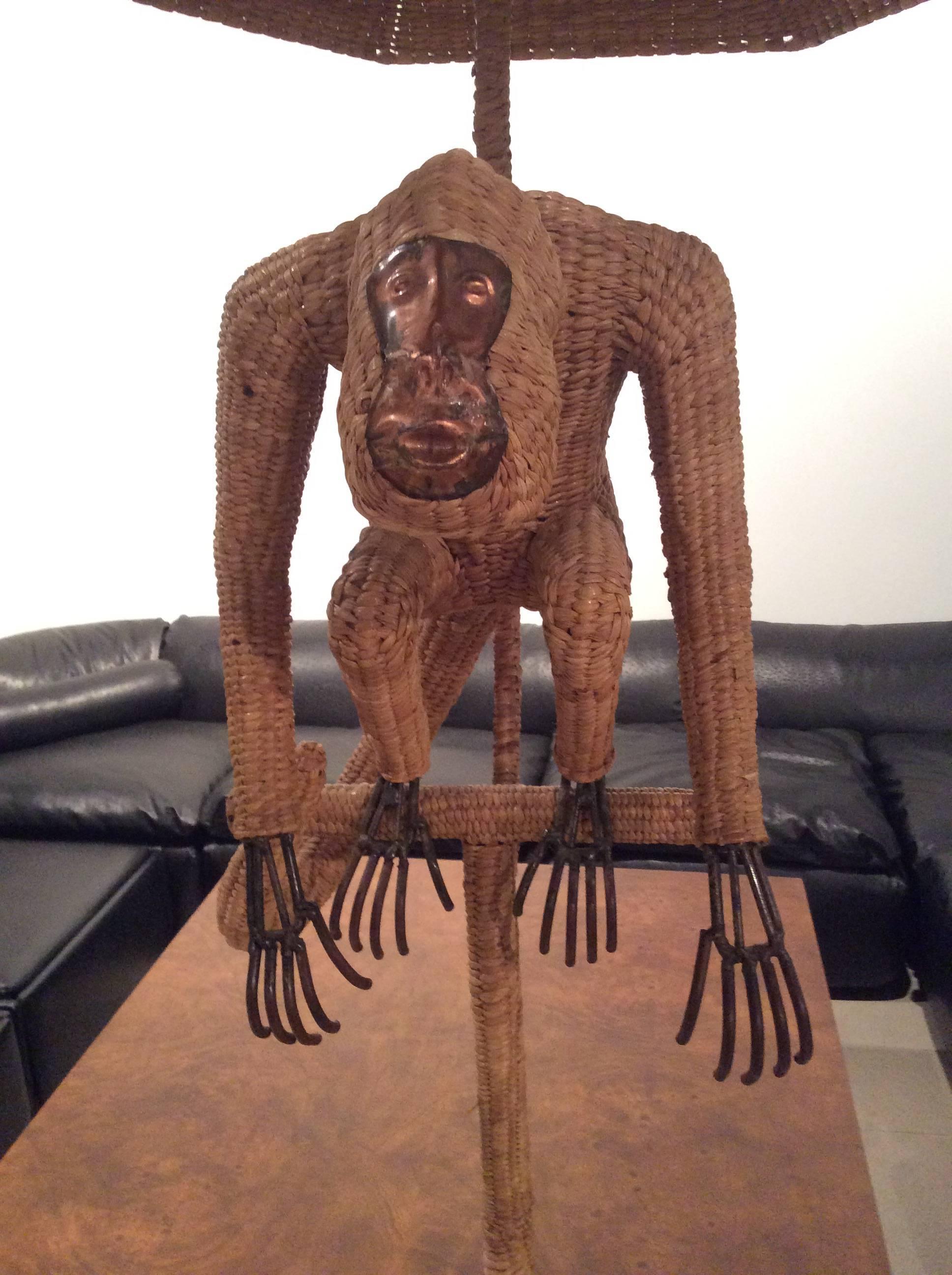 Wonderful vintage Mario Lopez Torres wicker, rattan monkey floor lamp with Greek key base. Tagged on the bottom (pictured) original shade is included. Perfect for your Palm Beach tropical island decor. 
Dimensions are 72 tall X 22.50 deep X 26 wide