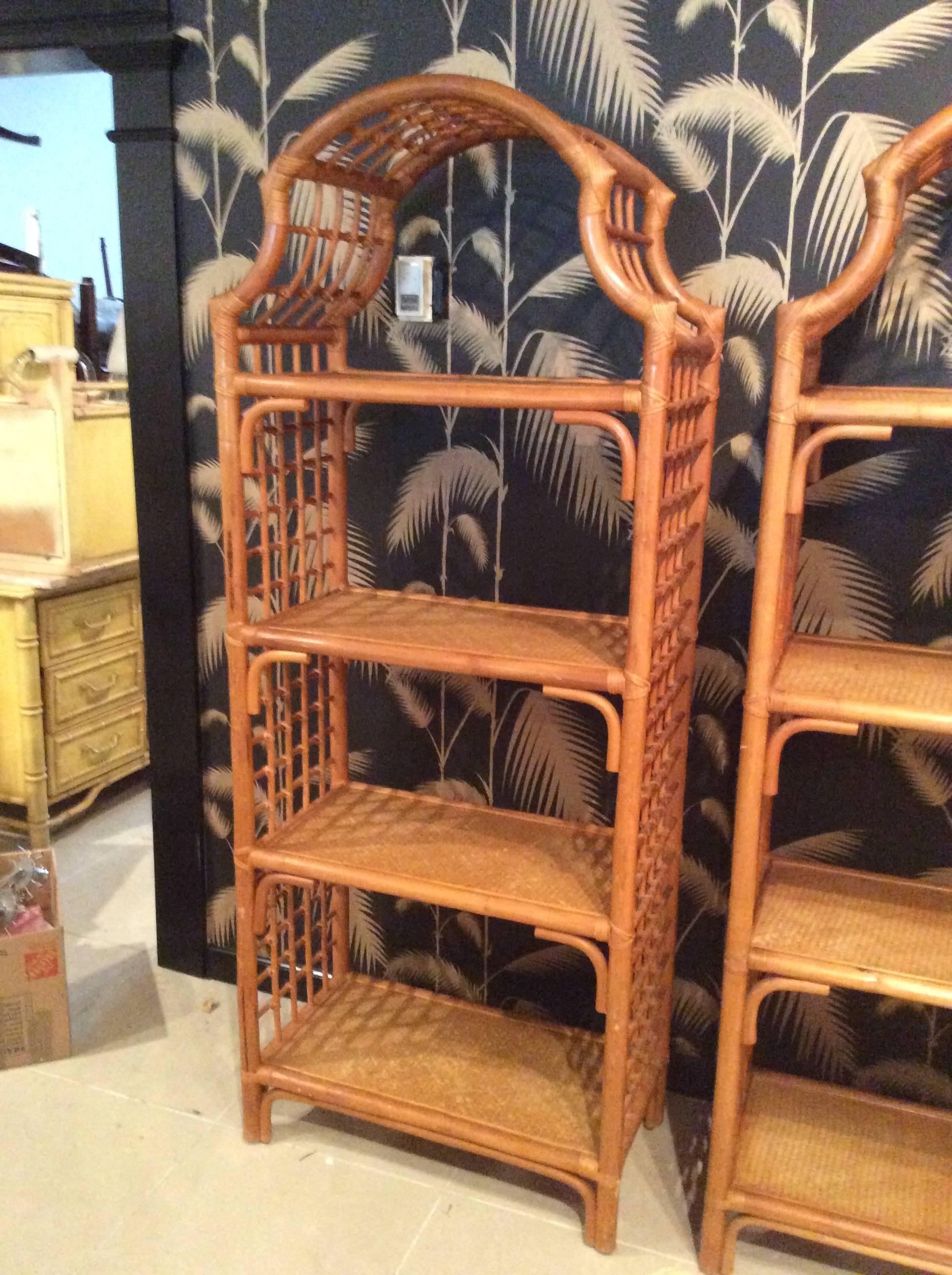 Lovely pair of vintage rattan pagoda etageres with woven wicker shelves. Great Hollywood Regency, Palm Beach, Tropical look. 