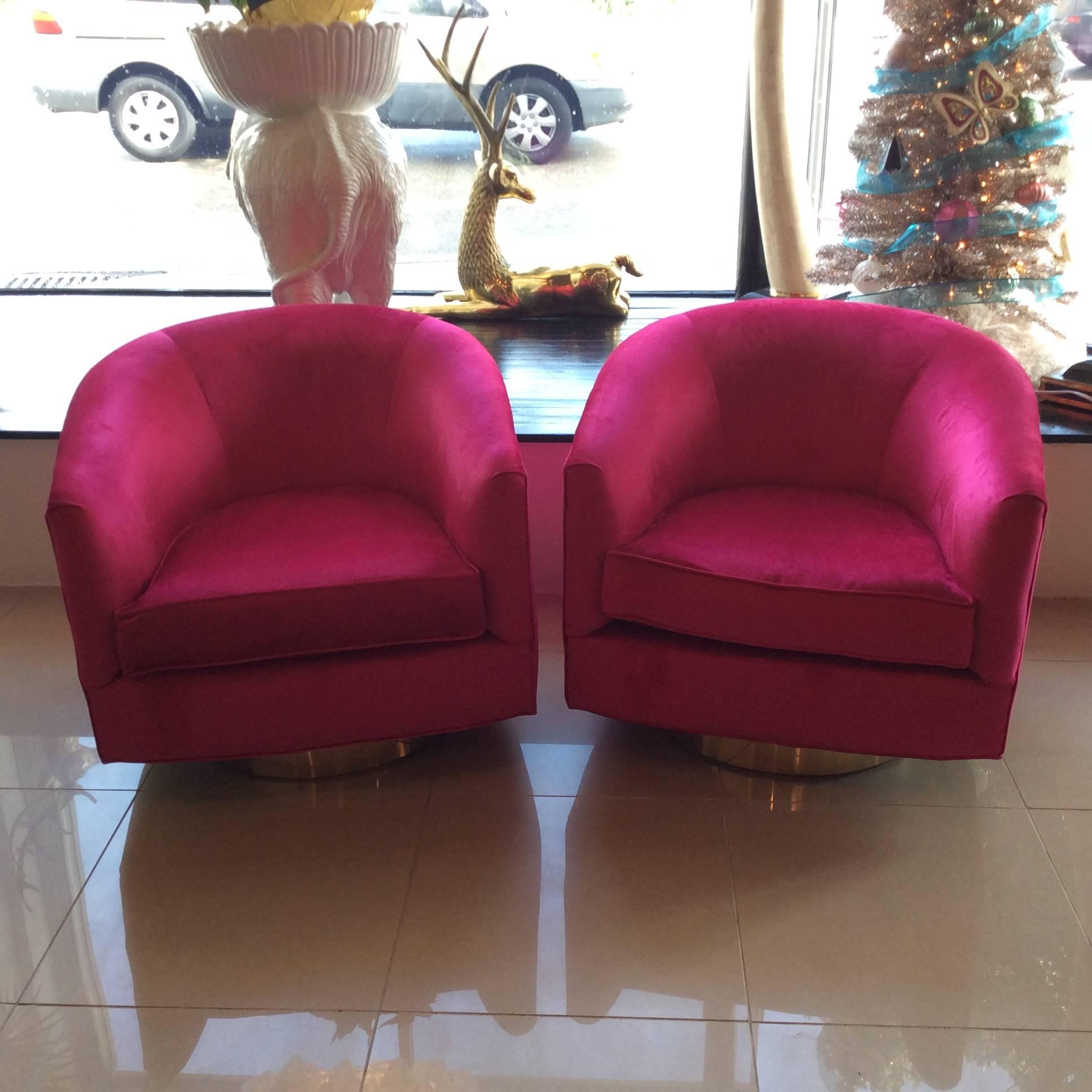 The most amazing vintage Milo Baughman tub, barrel, swivel armchairs, newly upholstered in a hot pink fuchsia velvet fabric with original brass gold platform bases. Great Hollywood Regency chairs!
Cushion depth 20.
