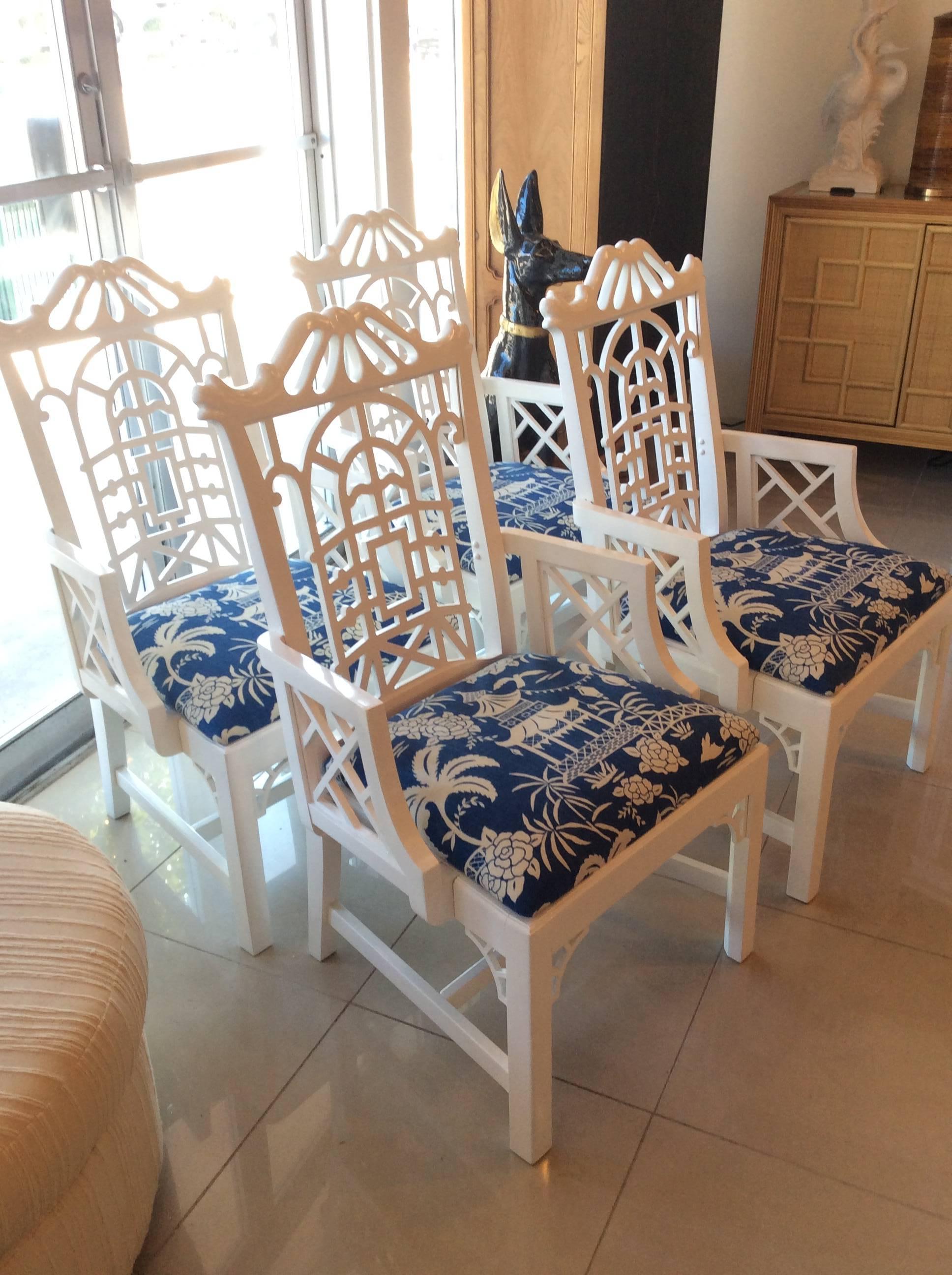Amazing vintage PAIR of arm dining chairs, pagoda top, Chinese Chippendale, fretwork arms, newly upholstered pagoda navy blue linen cushions. Newly professionally lacquered in a white gloss. May be minor imperfections to the newly lacquered finish.
