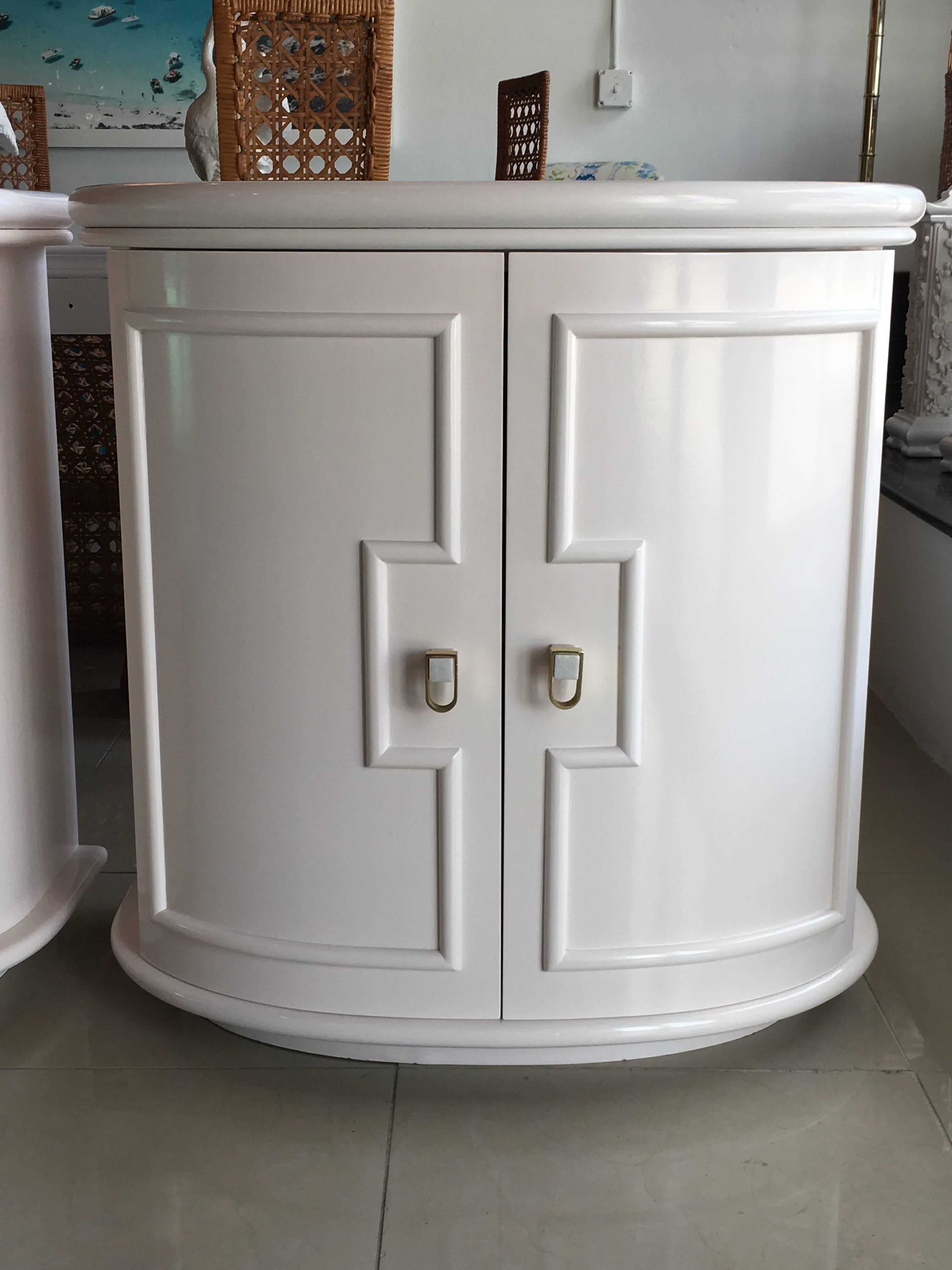 These are absolutely stunning! Professionally lacquered in a barely there Blush pale pink gloss, inside and out. New brass and marble hardware. Shelf inside, curved doors, solid wood, one of a kind! Perfect as nightstands, oversized chests, side or