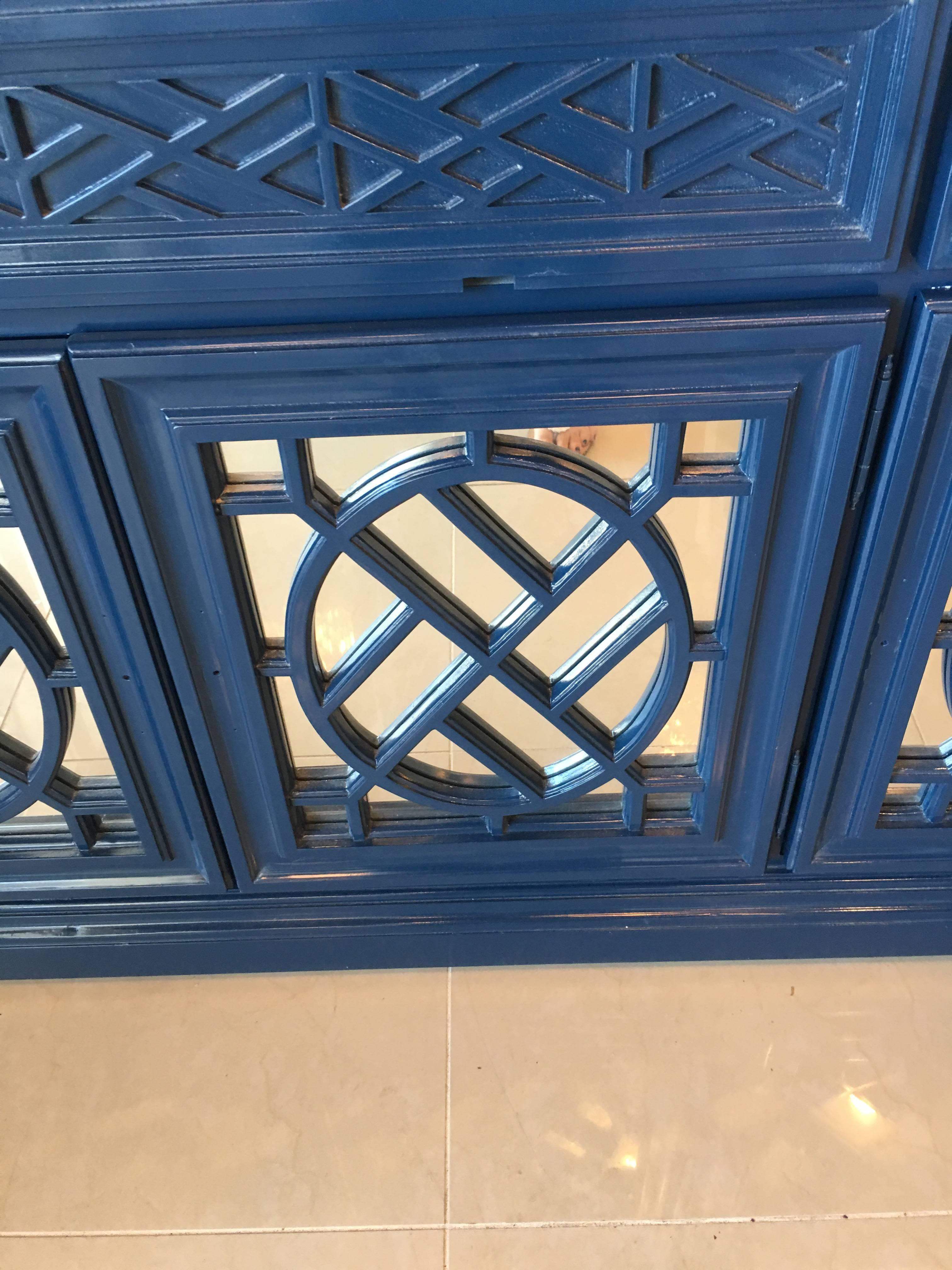 Vintage newly lacquered navy gloss Chinese Chippendale fretwork mirrored credenza sideboard buffet. Brass hardware will be polished and added prior to shipping. Shelves inside. Perfect chinoiserie, Palm Beach piece.