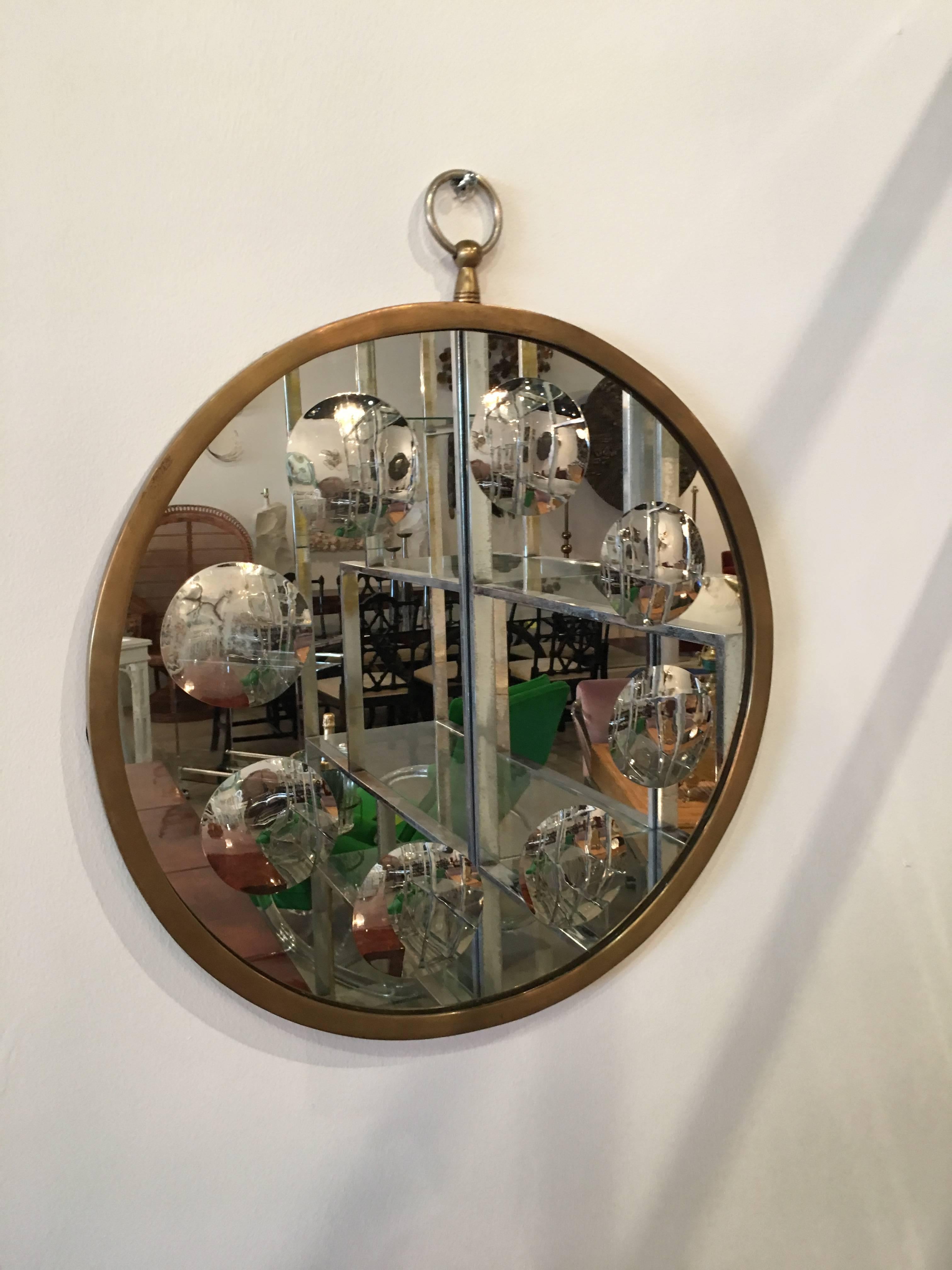 Vintage round op Opi art wall mirror.