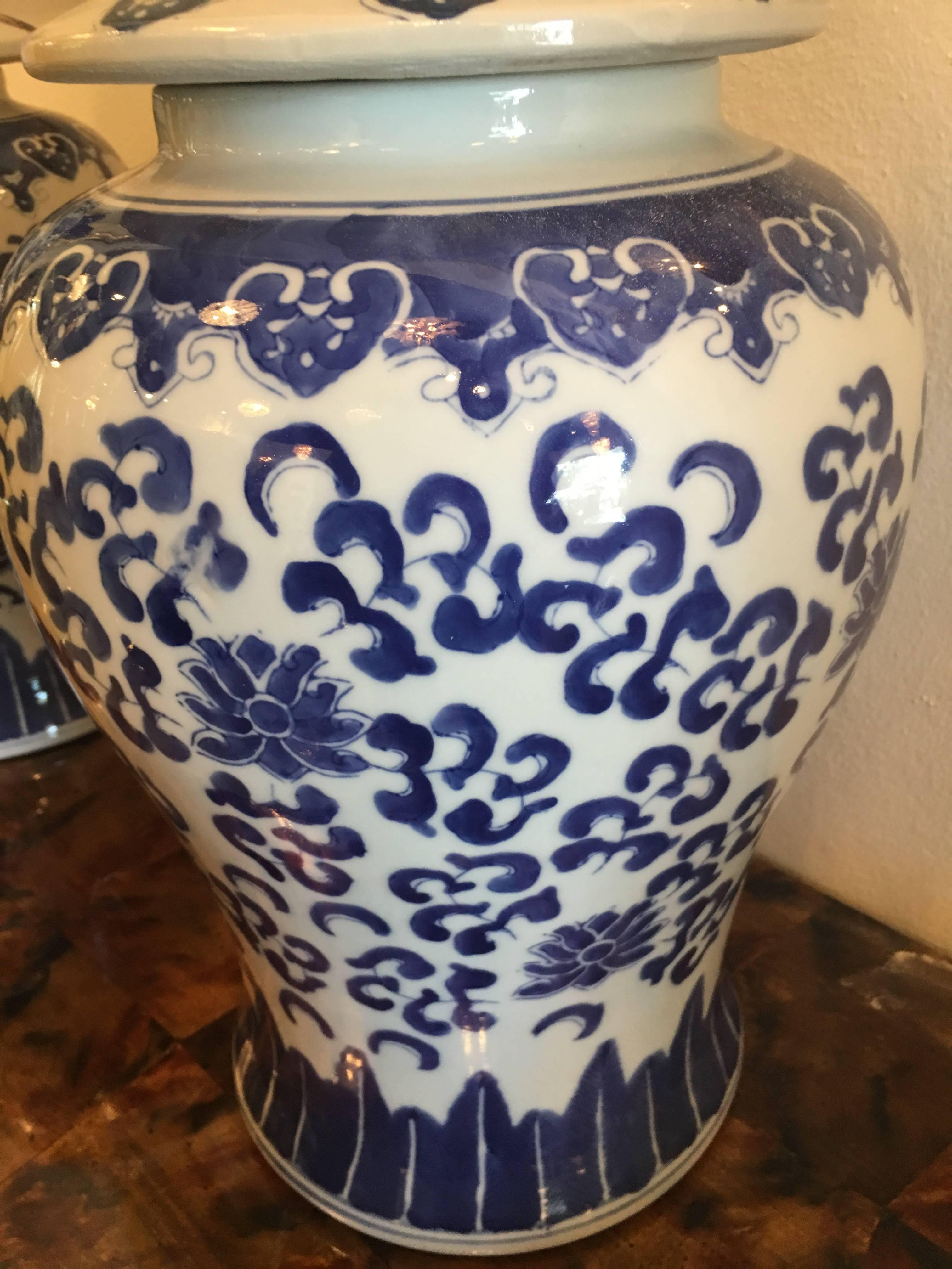 Chinoiserie Foo Dogs Blue and White Ginger Jars Pair Vintage Large Urns Palm Beach Oriental For Sale
