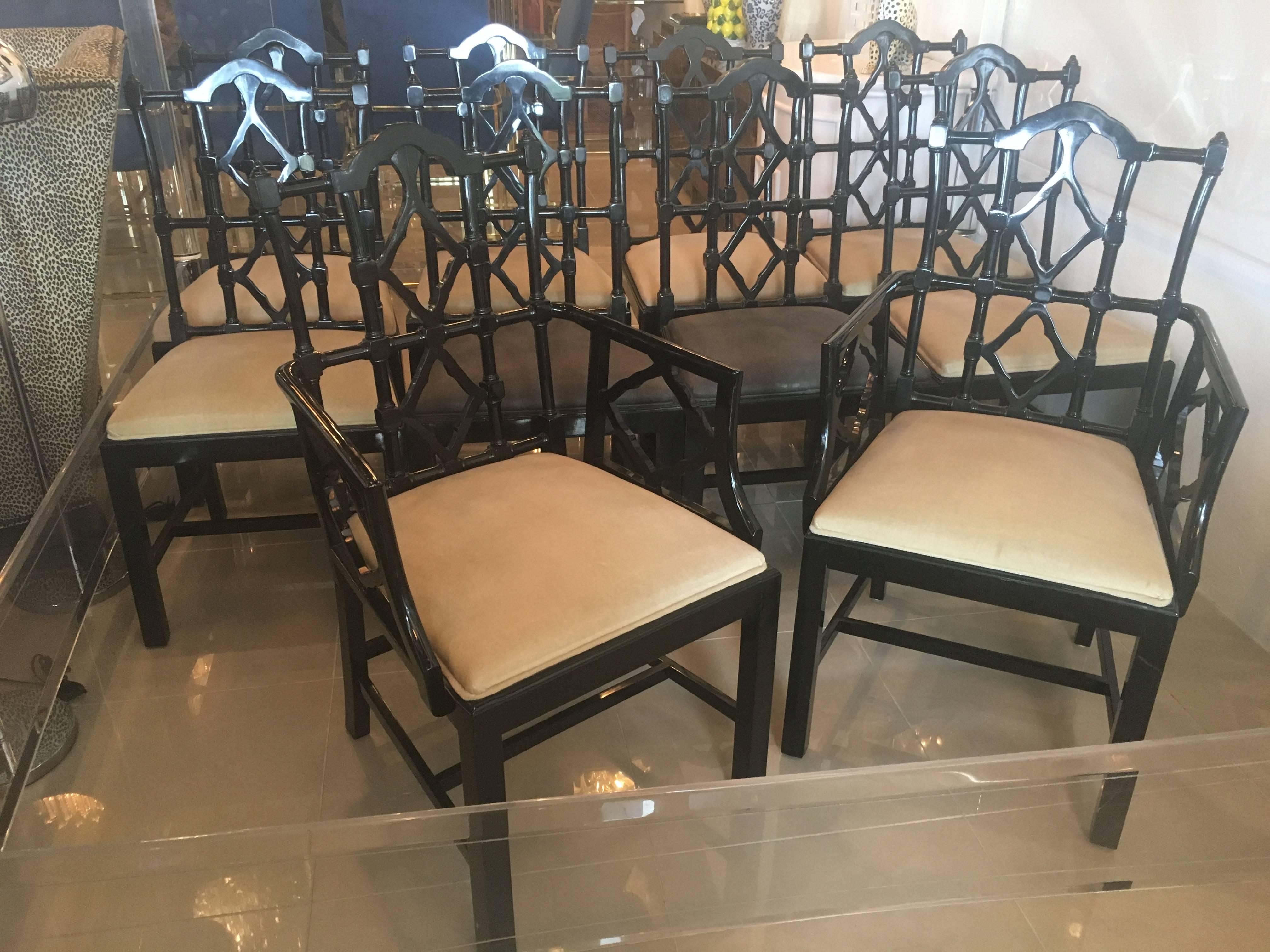 Wonderful set of ten Chinese Chippendale chinoiserie fretwork dining chairs, two-arm chairs and eight side chairs. Marked made in Spain underneath. These are very sturdy chairs! Original black lacquer is in good condition with some scuffs and