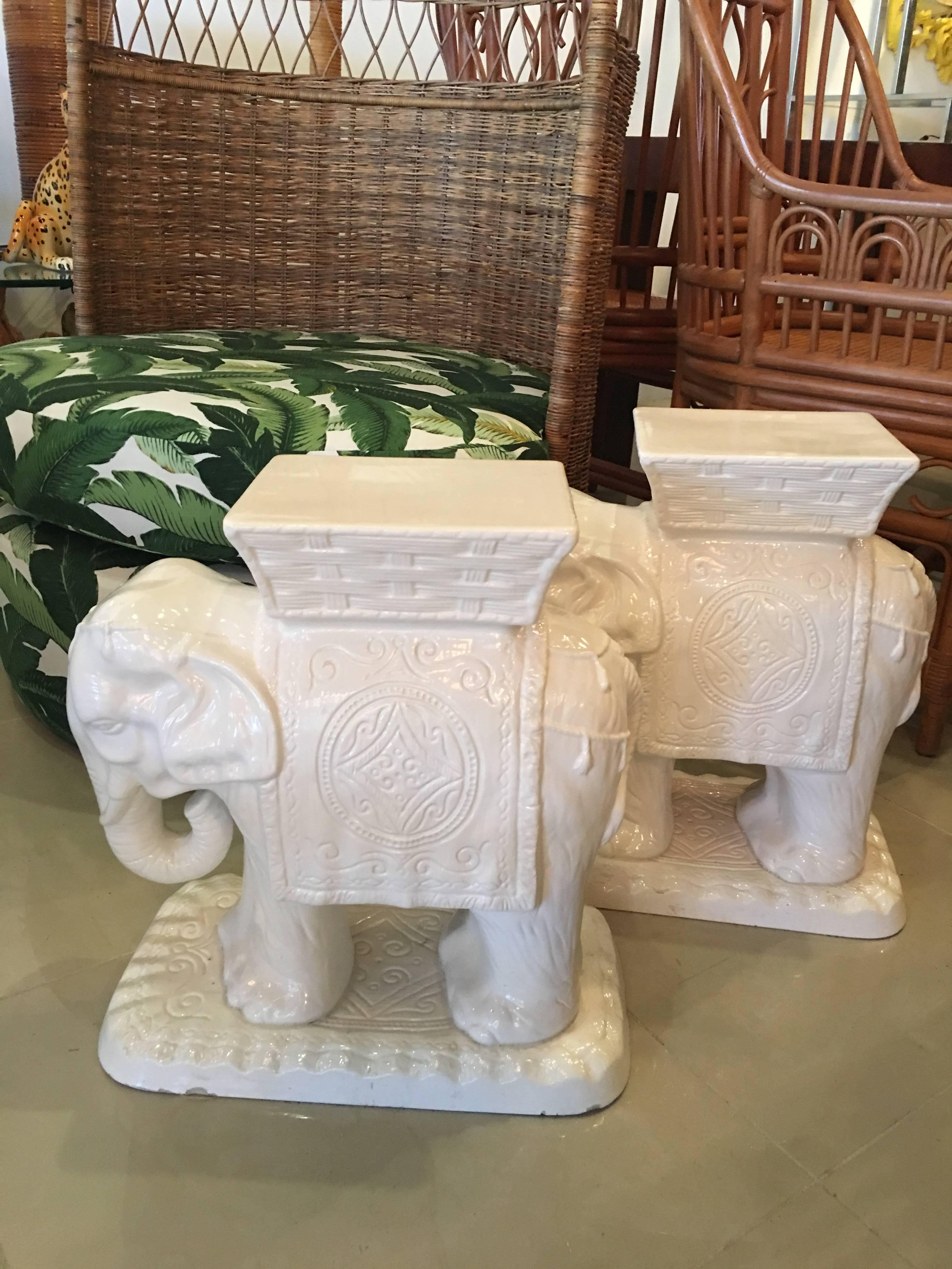 The sweetest pair of vintage white ceramic elephant garden stools. Love the basket weave and tassel details!