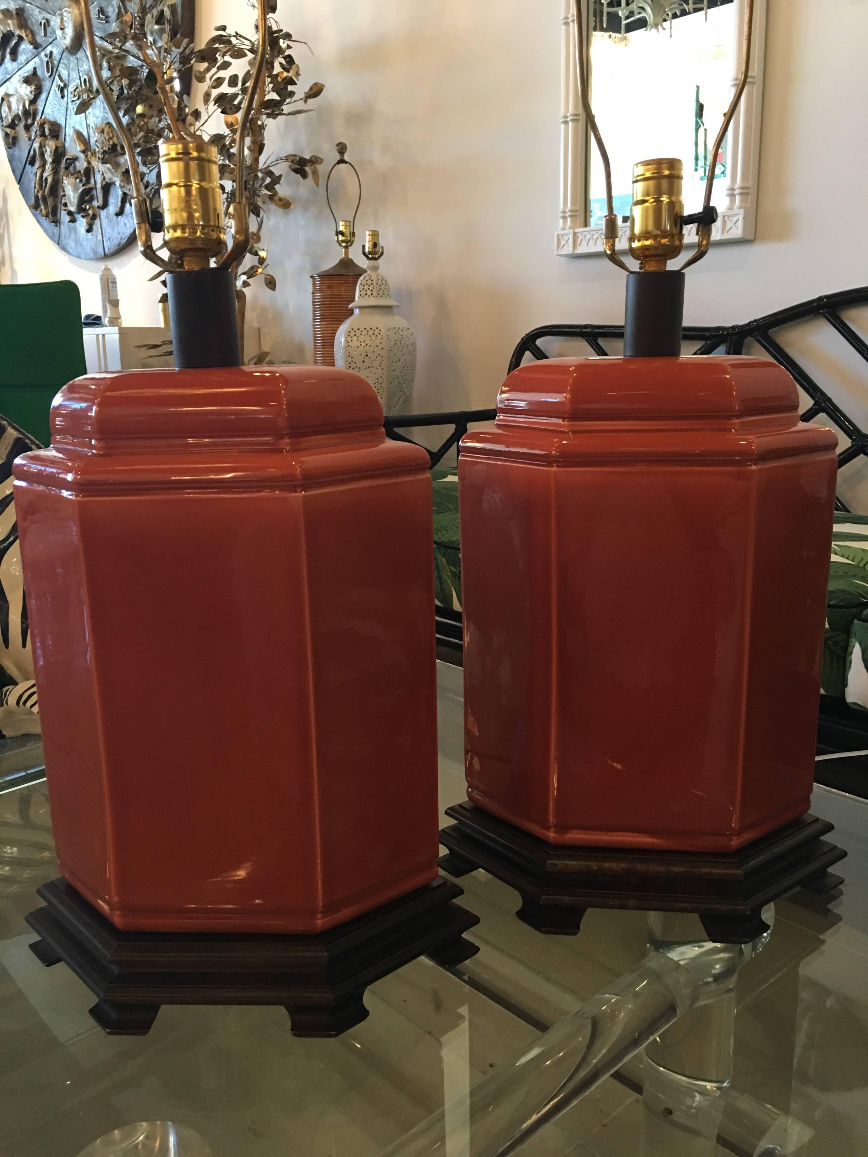 Lovely pair of vintage ceramic table lamps. Wonderful shade of orange, fantastic shape! Brass Asian, Hollywood Regency finial. Lampshades not included. No chips or breaks.
Measures: 31" tall to finial
20" tall to socket.