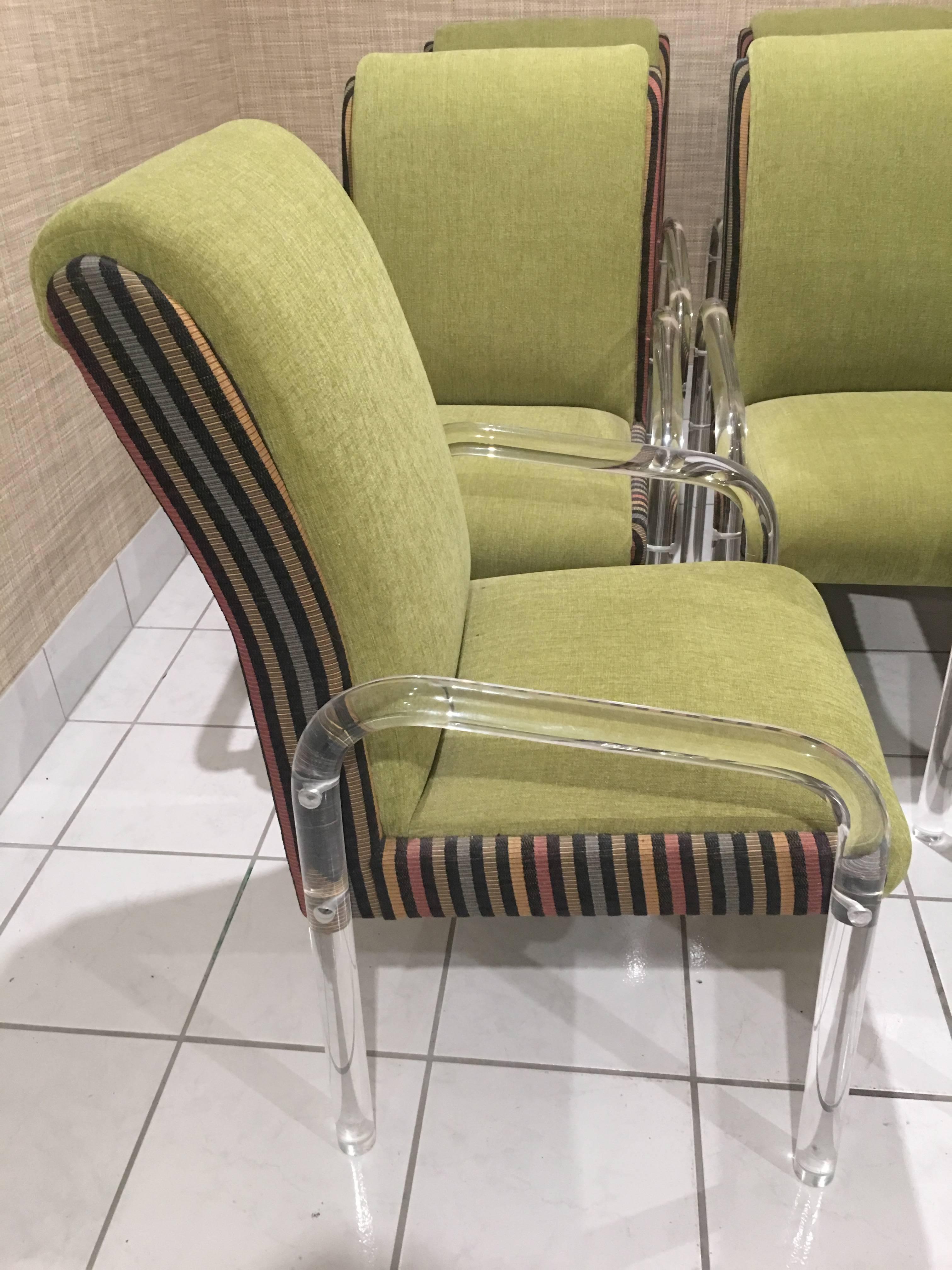 Set of Eight vintage Lucite arm dining chairs by Leon Pace.
These have there original upholstery which may have some slight stains. No defects to the Lucite.