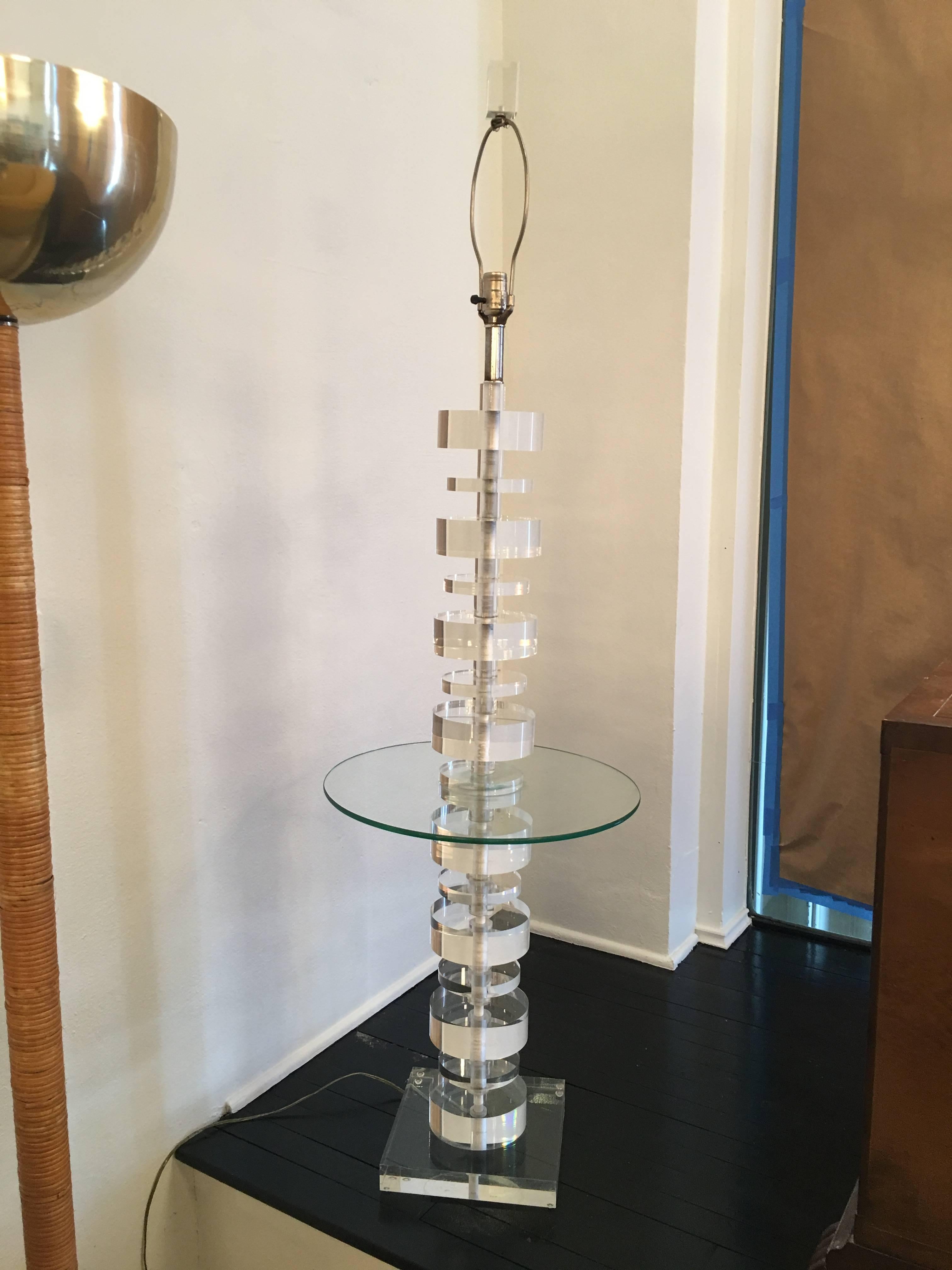 Amazing vintage Lucite floor table lamp. Very heavy! The large disks measure 2 x 6. The height is 51 to socket and 61 to top of Lucite finial. Original Lucite finial included. Tested, working order.