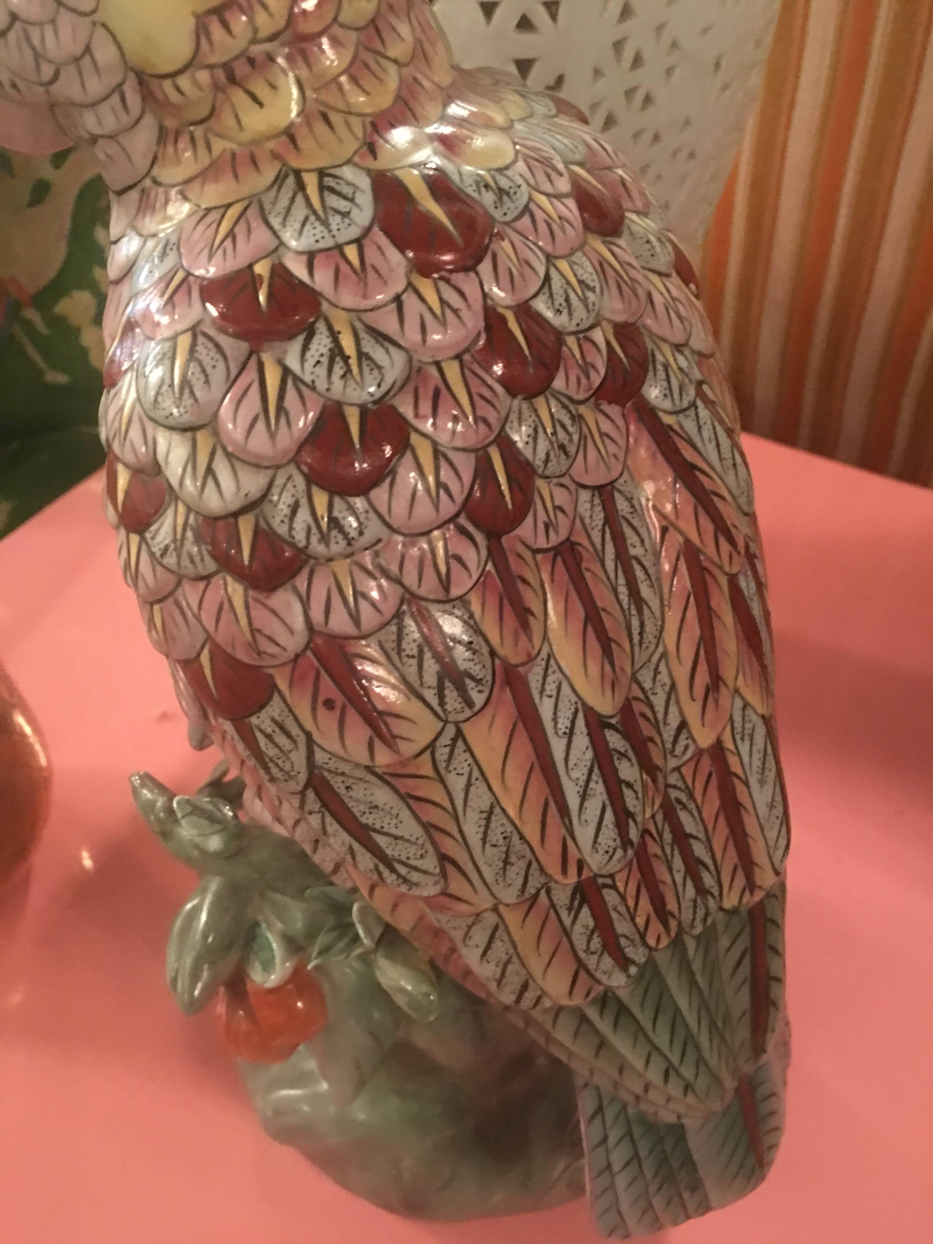 Lovely vintage large tropical parrot porcelain statue with pink and purple colors. No chips or breaks.