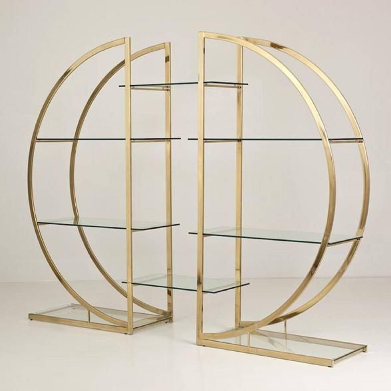 Amazing Milo Baughman brass pair of display shelves or étagères. This can be made into one étagère as pictured or the étagères can be separated into a pair. Great piece! Mid-Century Modern, Hollywood Regency style. Some scuffs, patina areas to