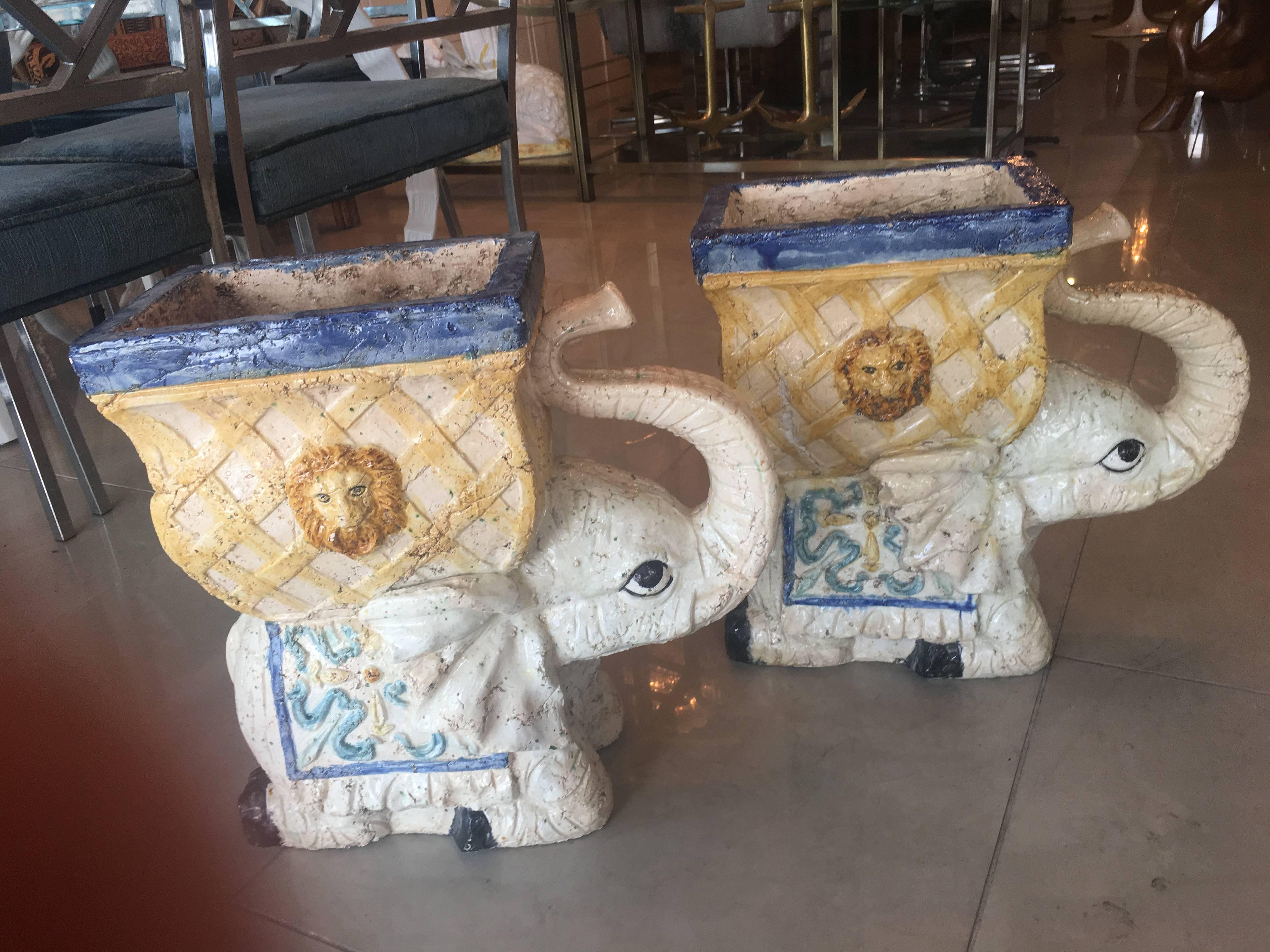 The most wonderful pair of old Italian elephant garden plant stands. I believe these are some sort of terra cotta with a glaze on top, they are heavy! The details are amazing from the lattice pots with lions to the delicate motif on the elephants.