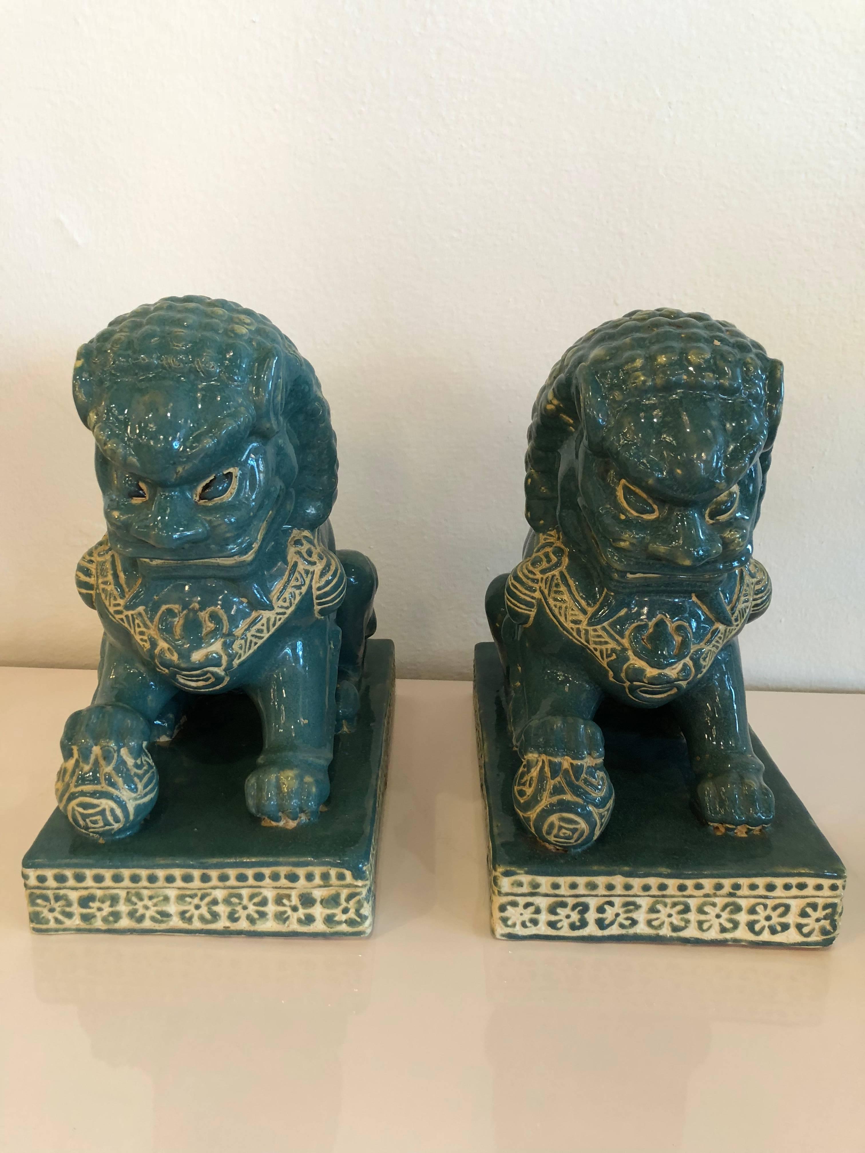 Lovely pair of  vintage teal green blue foo dogs. No chips or breaks. 