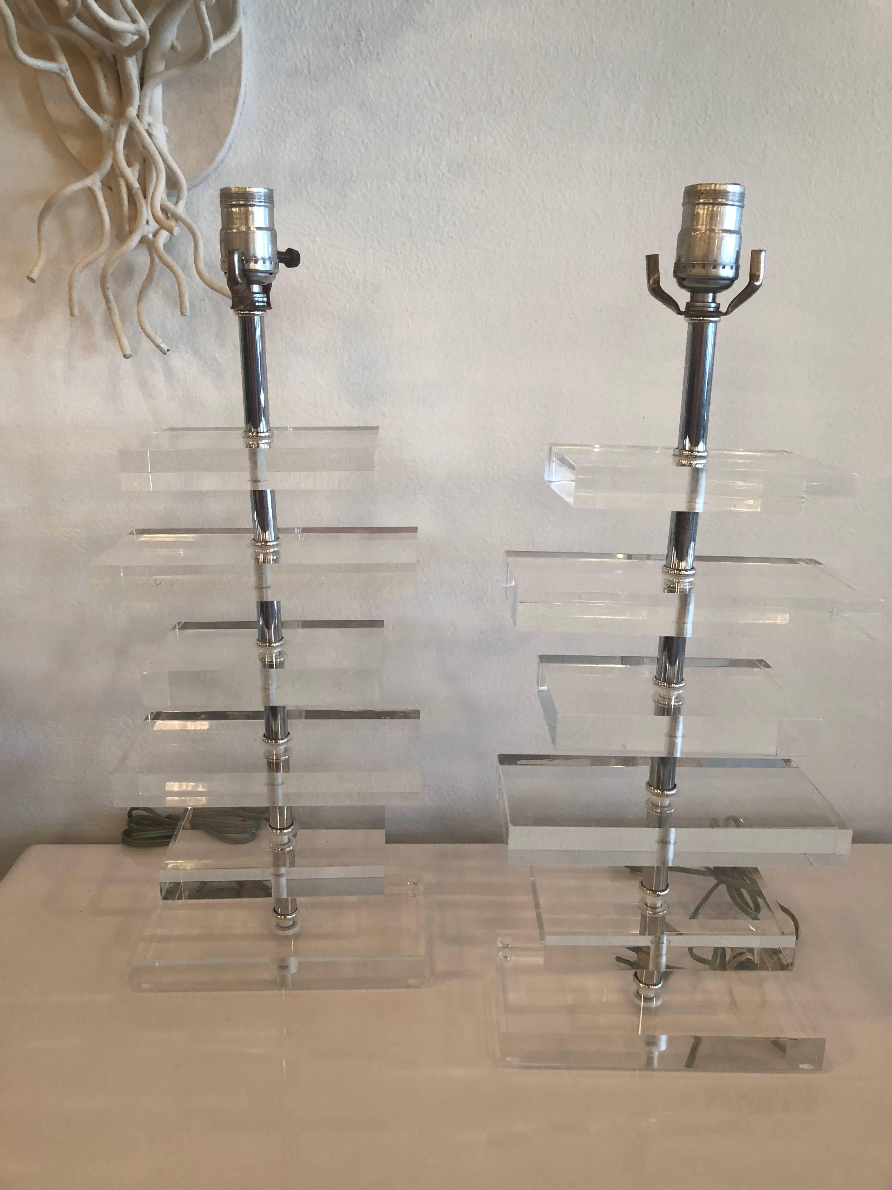 Vintage pair of stacked Lucite and chrome lamps, signed Marla. These will be newly wired.