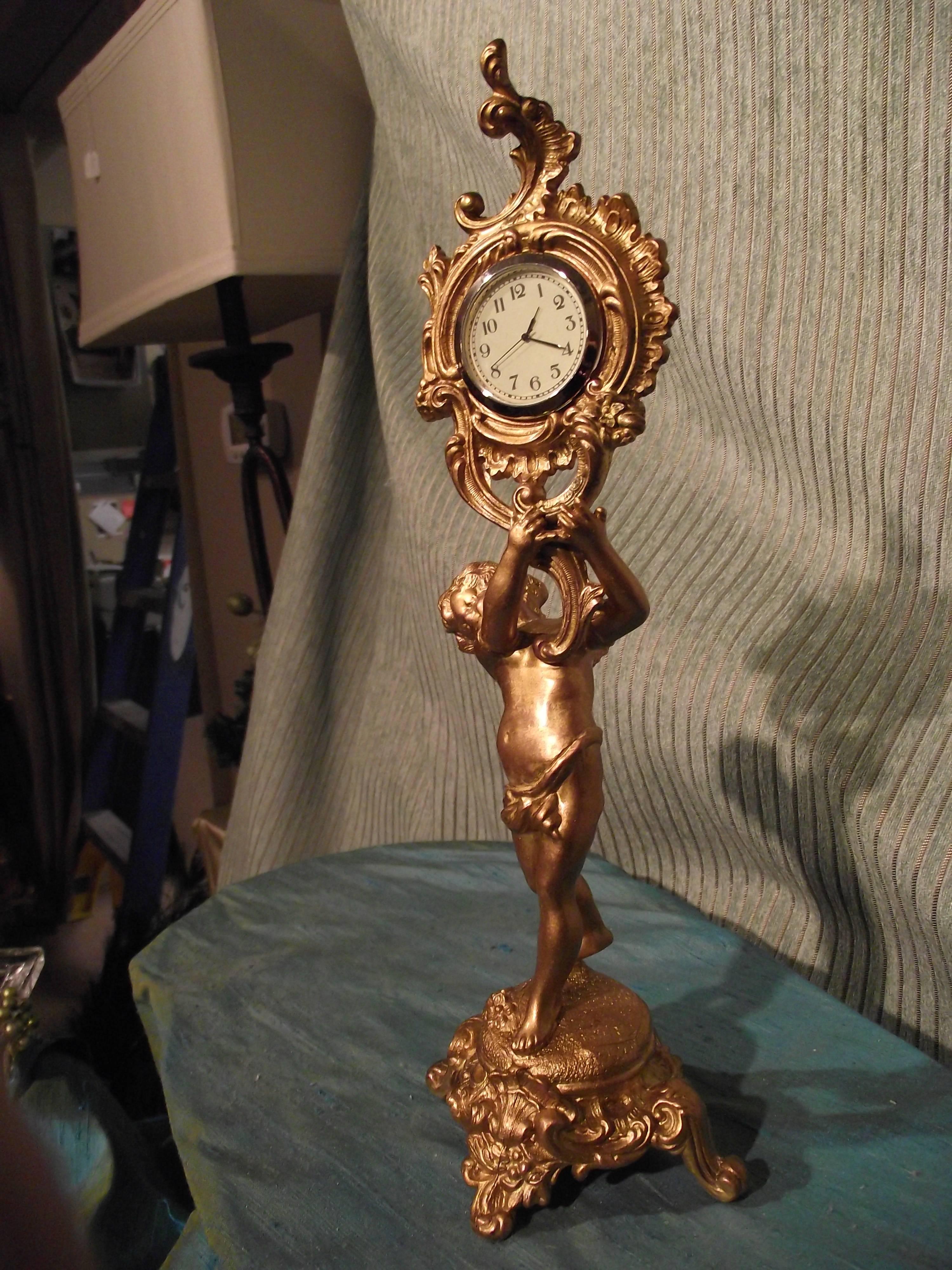 This beautiful little clock is sold as a "decorator piece". Without the original 3 day wind works it has only it does not have antique value. Few people want to wind a clock every three days anyway. This little charmer would be great in a