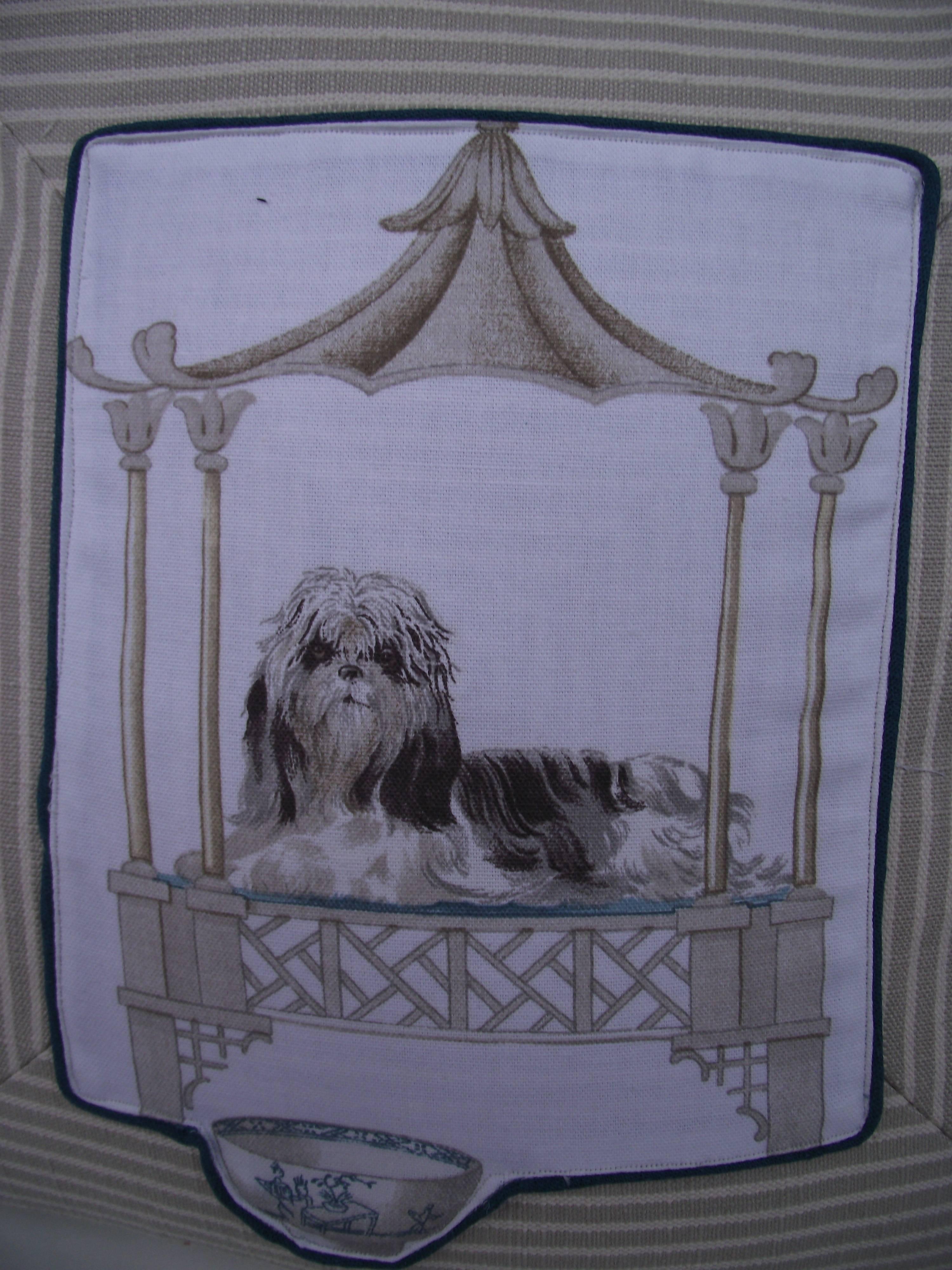 Using a vintage novelty print by Robert Allen Fabrics each pillow features one of the many breeds represented in the fabric. The design is sewn to a light beige and white upholstery grade linen. The stripe is mitered on the front of the pillow and
