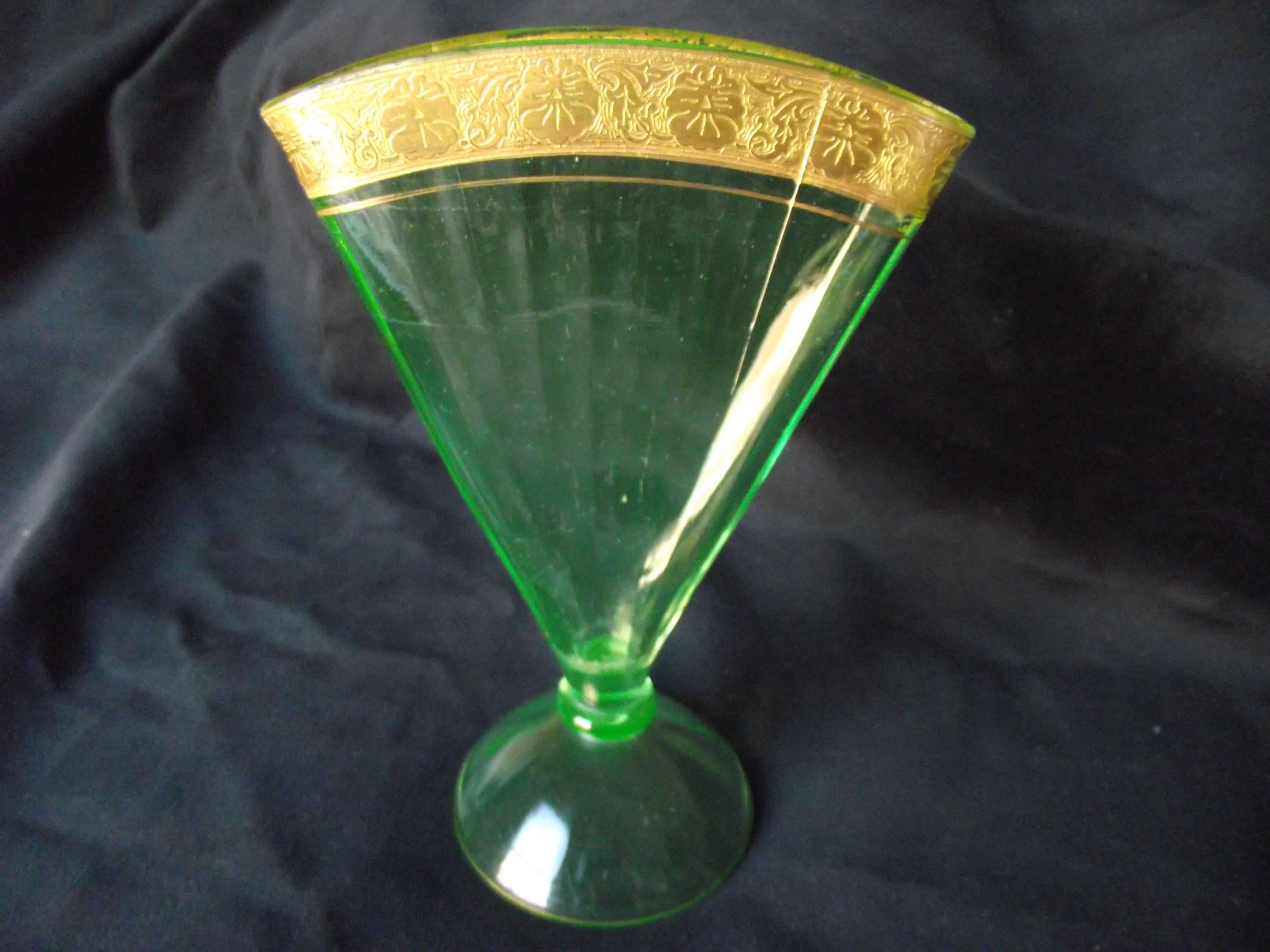 green glass vase with gold trim