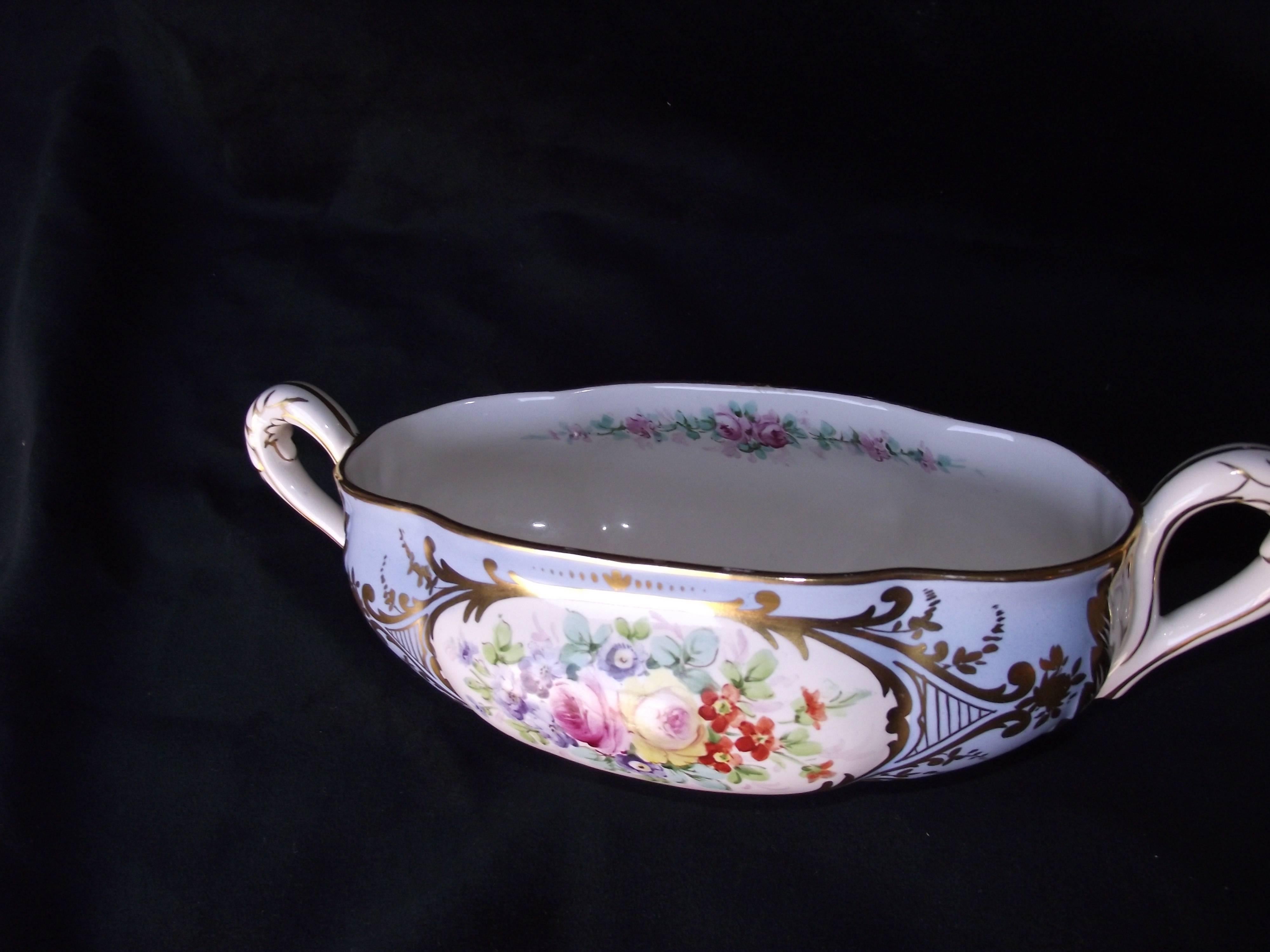 This beautifully decorated low bowl/vase/centerpiece was made by the Amoges China Co, out of Trenton, New Jersey only produced pottery from 1944-1948, making their pottery run very limited and highly sought after by collectors.