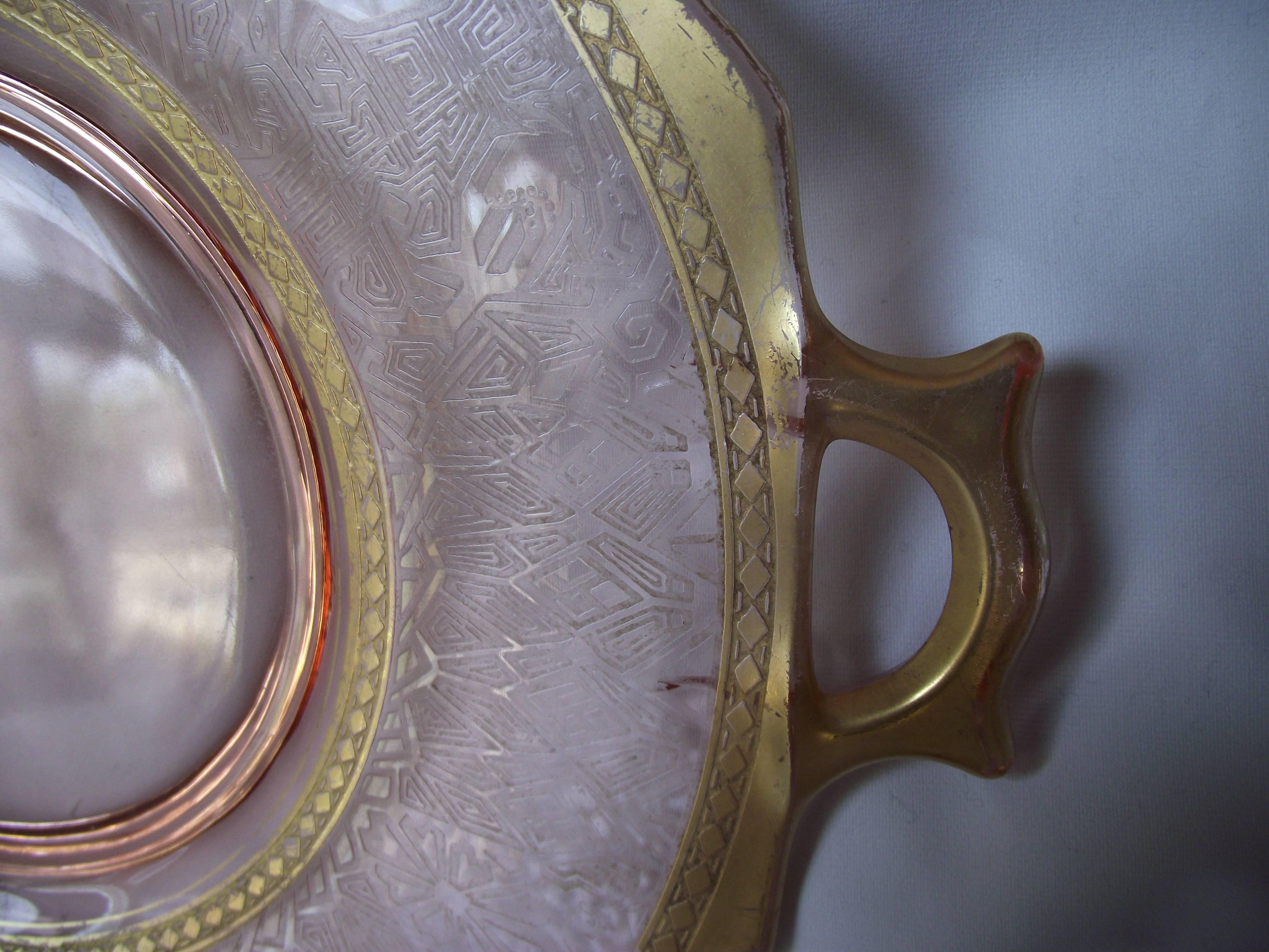 pink depression glass platter with handles