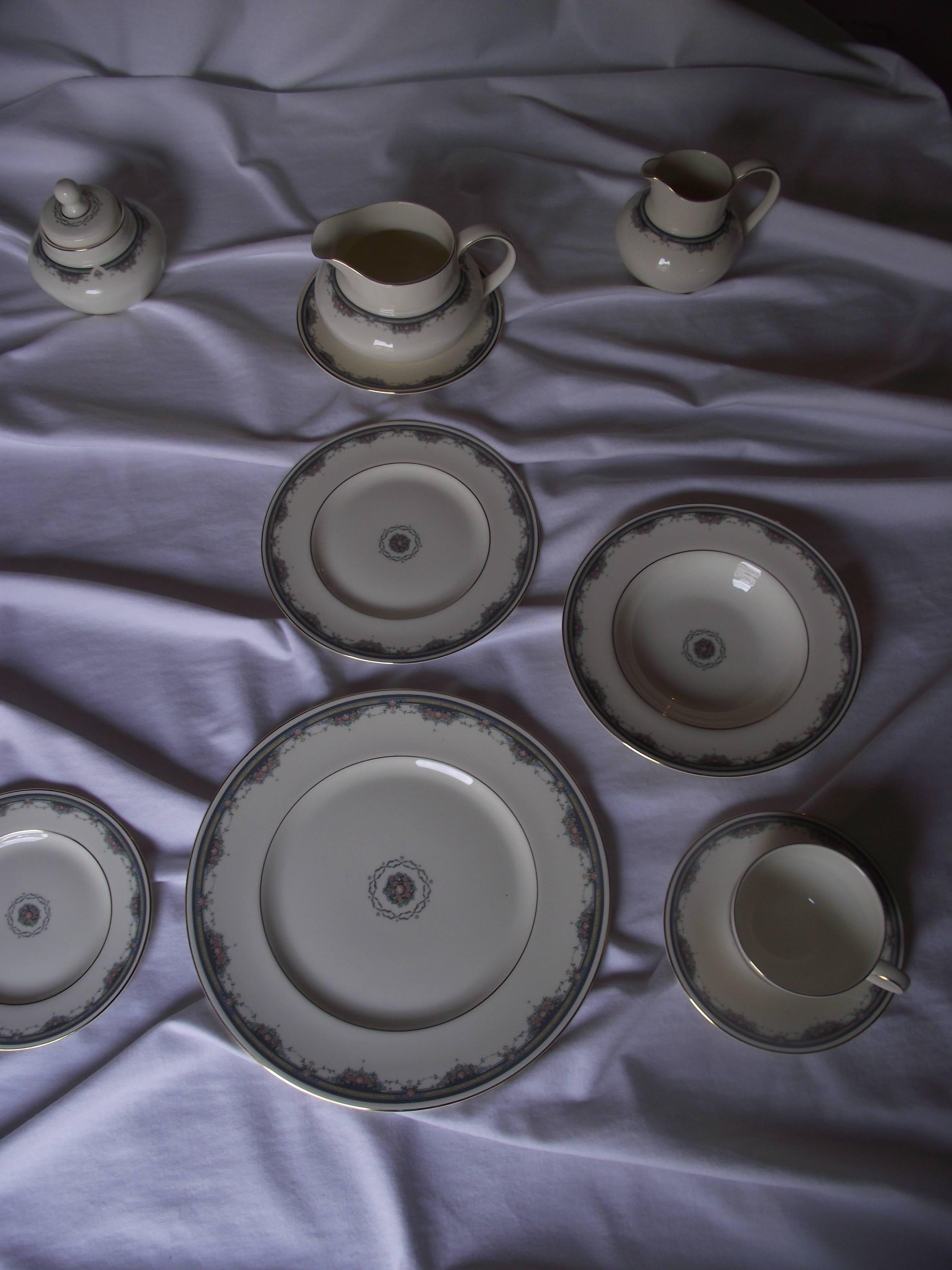 This beautiful Royal Doulton bone china is a complete service for eight with extra pieces. It consists of:
Eight soup bowls
Eight bread and butter plates
16 desert/salad plates
16 dinner plates
Eight tea cups and saucers
One covered sugar and