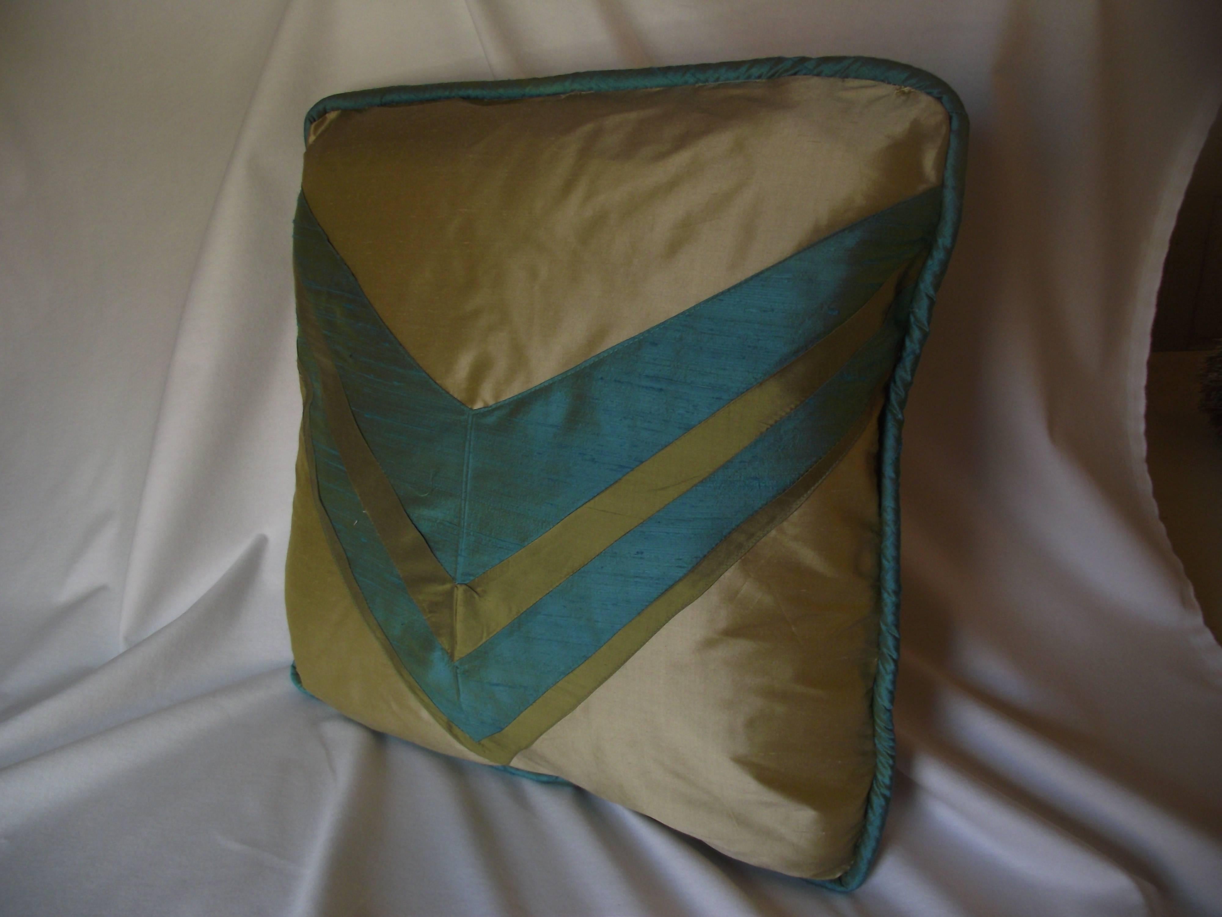 Original deco designed throw pillow by Gantt Design Studio. It is made of three colors of silk and comes on a non allergic polyester pillow bat insert.