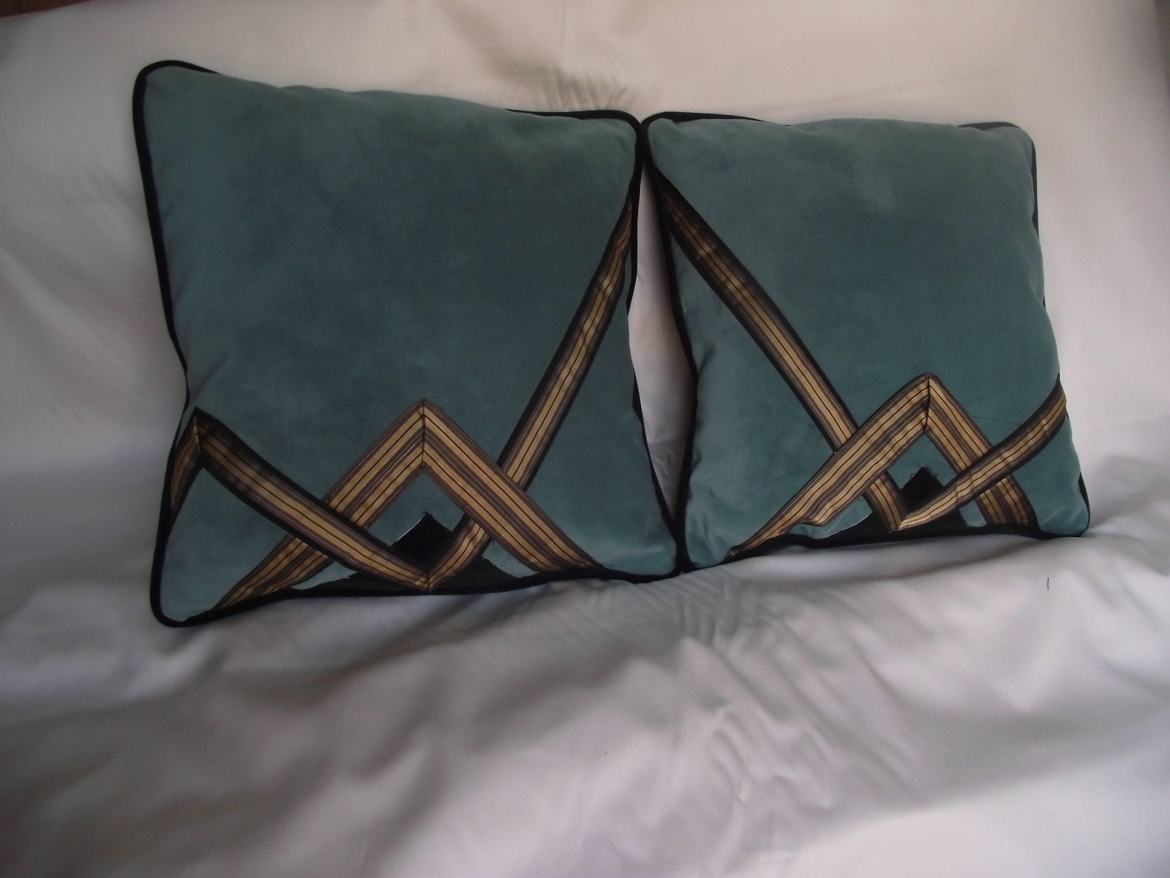 This pair of signed velvet pillows features an original deco style design by Gantt Design studio. As you can see in the pictures when the pillows are placed side by side the design continues from one pillow through the other.

The opposite side of