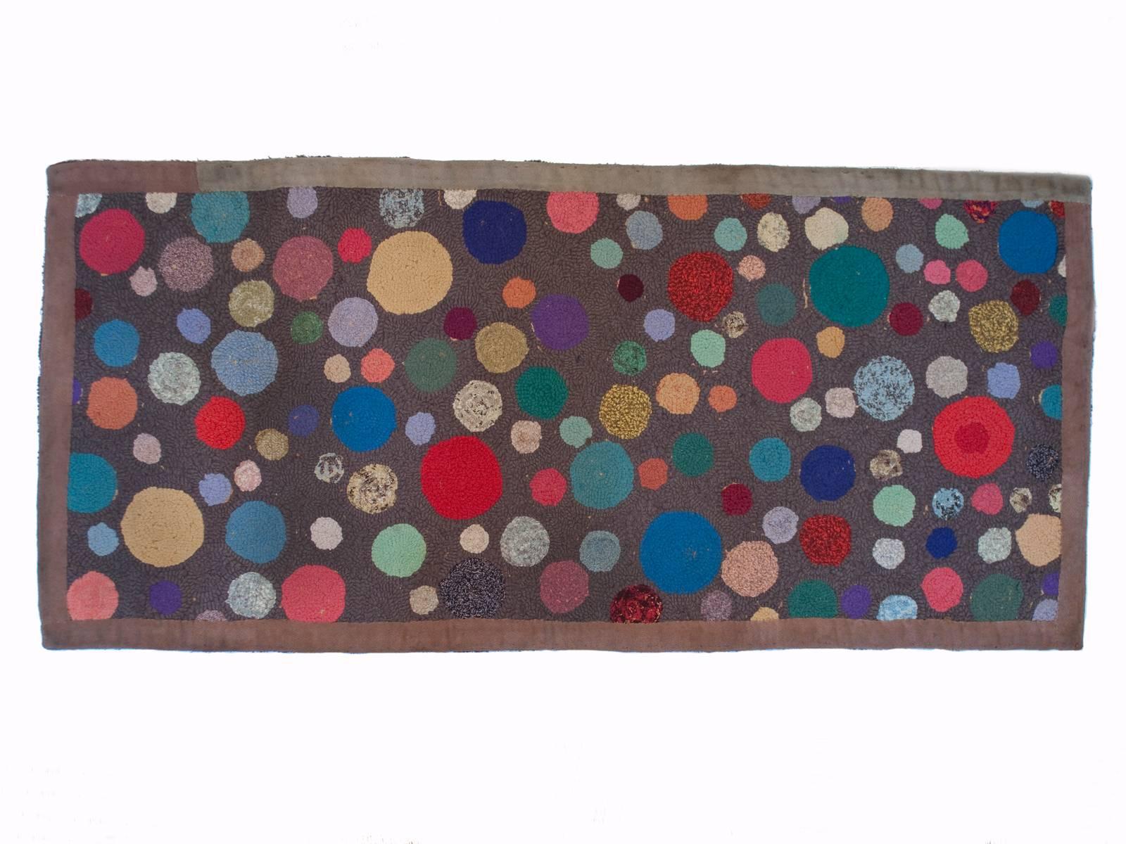 Offered by ZENA KRUZICK
Early 20th century graphic American hooked rug with dots.
Ex Fifi White collection.