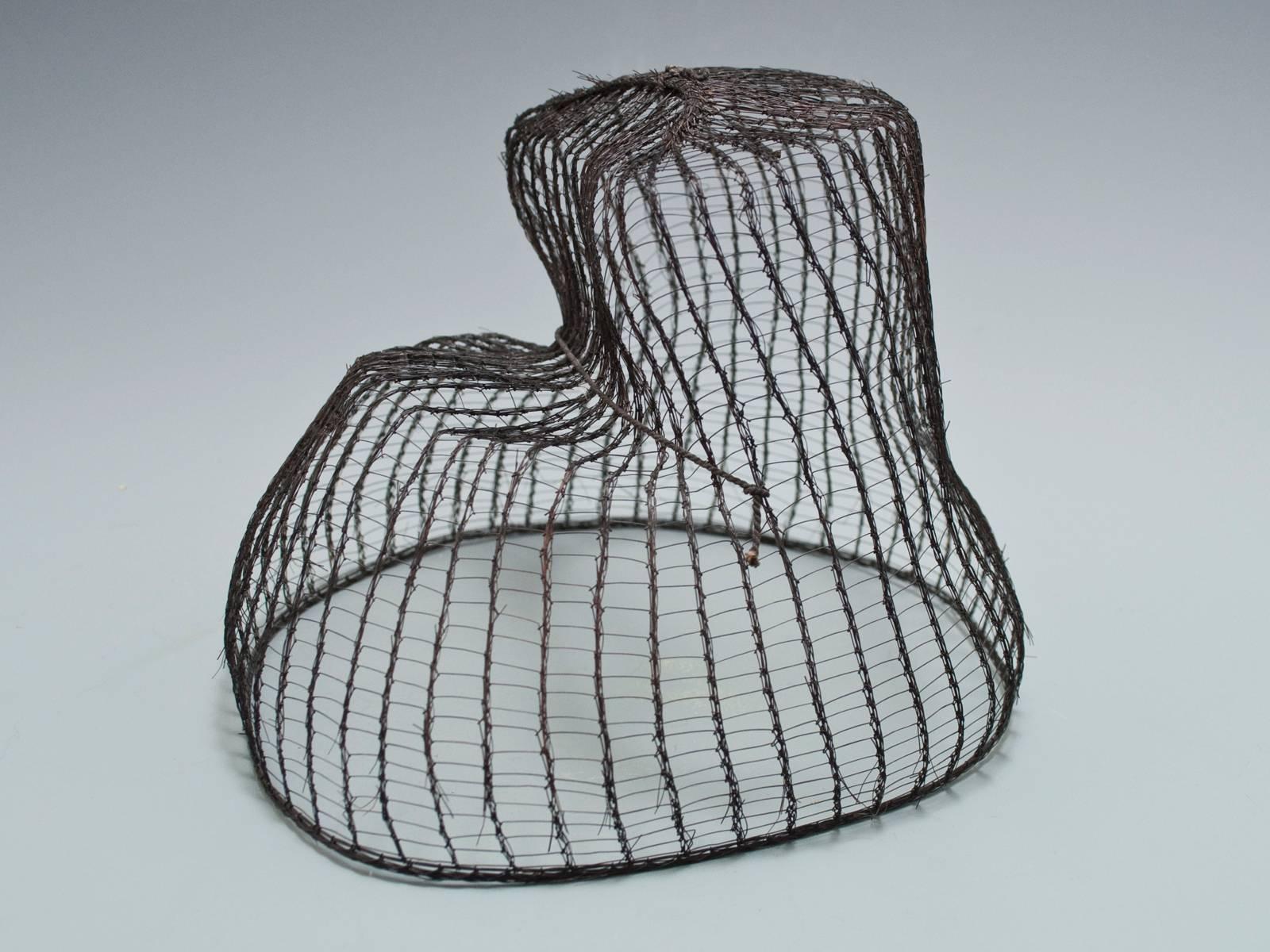 Late 19th century horse hair hat from Korea.
A very sculptural tanggeon (탕건), the inner skullcap that protected a man's topknot, which was used to support the broad rimmed hat, called a gat, the former of which could also be worn alone. It has the