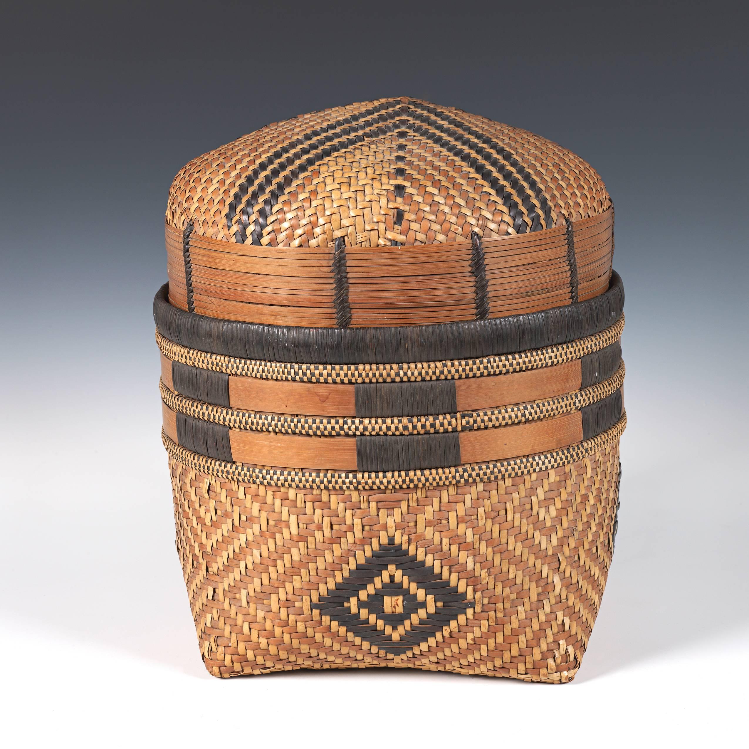 Large basket with geometric patterning.
Luba or Songye tribe in D. R. Congo.
From a Belgian colonial era collection.
This large storage basket woven in several different techniques is the finest we have ever seen either in private or in museum
