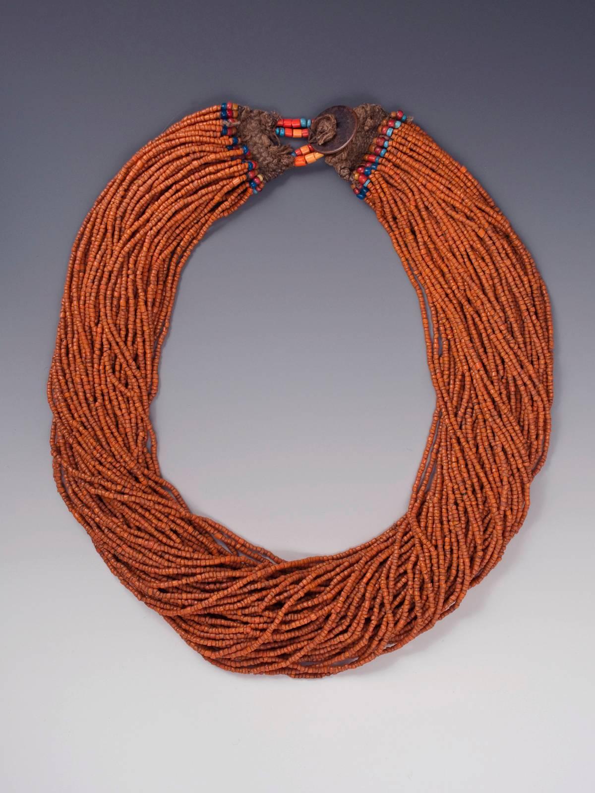 Offered by Zena Kruzick
Early to mid-20th century orange tribal multi-strand beaded Naga necklace, Nagaland, India.
25.5 inches in circumference.
 