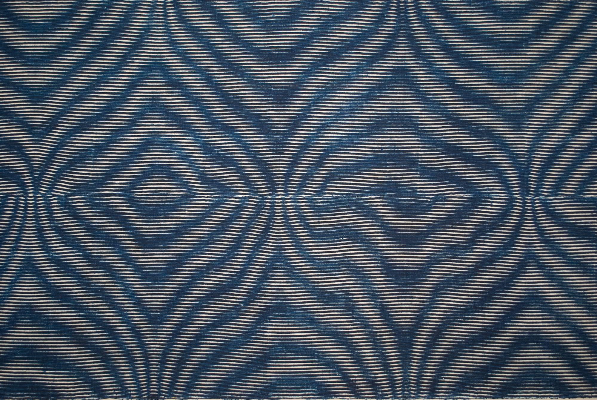 Offered by John Ruddy
Late 19th century stencil-dyed futon cover, Japan

Known as Kumano-zome, this cotton futon cover was dyed with natural indigo. The pattern is composed of very simple indigo and white stripes, stencil dyed, then overlaid with