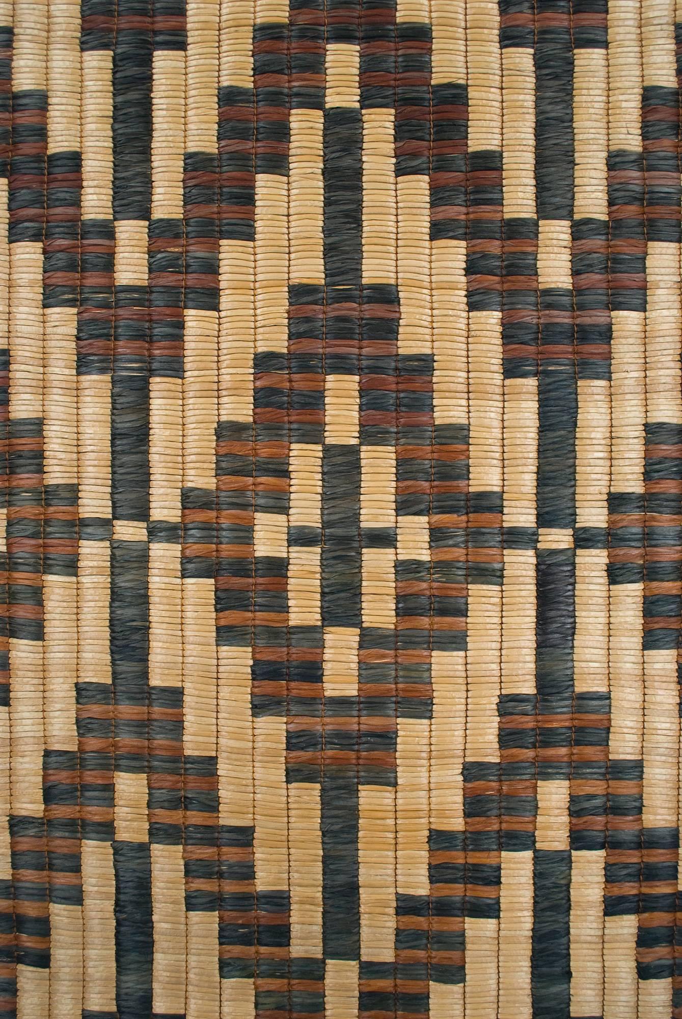Offered by John Ruddy
Woven mat, Ainu culture, Hokkaido, northern Japan, 20th century.

This woven mat is made of bulrush and dune grass, and would likely have been used as insulation along the interior walls of an Ainu home.
  