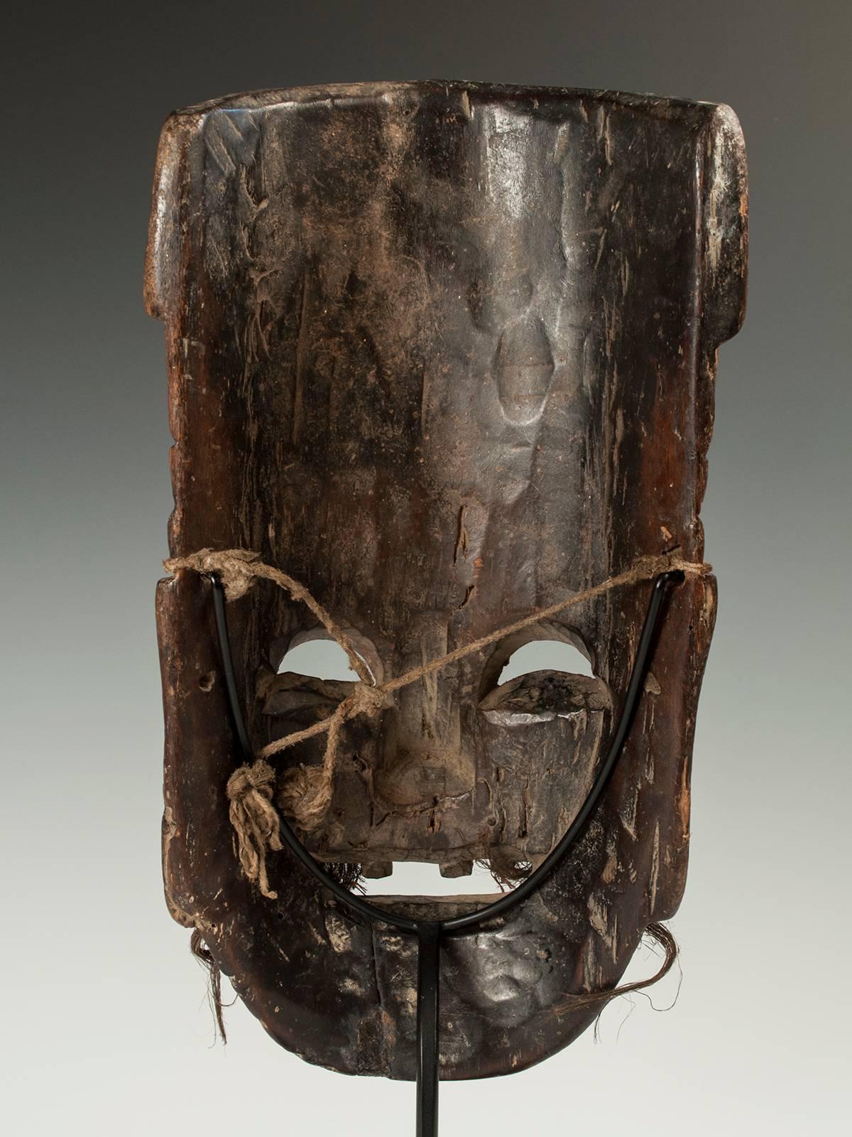 Late 19th-Early 20th Century Tribal Carved Wood Nuo Theater Mask, China In Distressed Condition In Point Richmond, CA